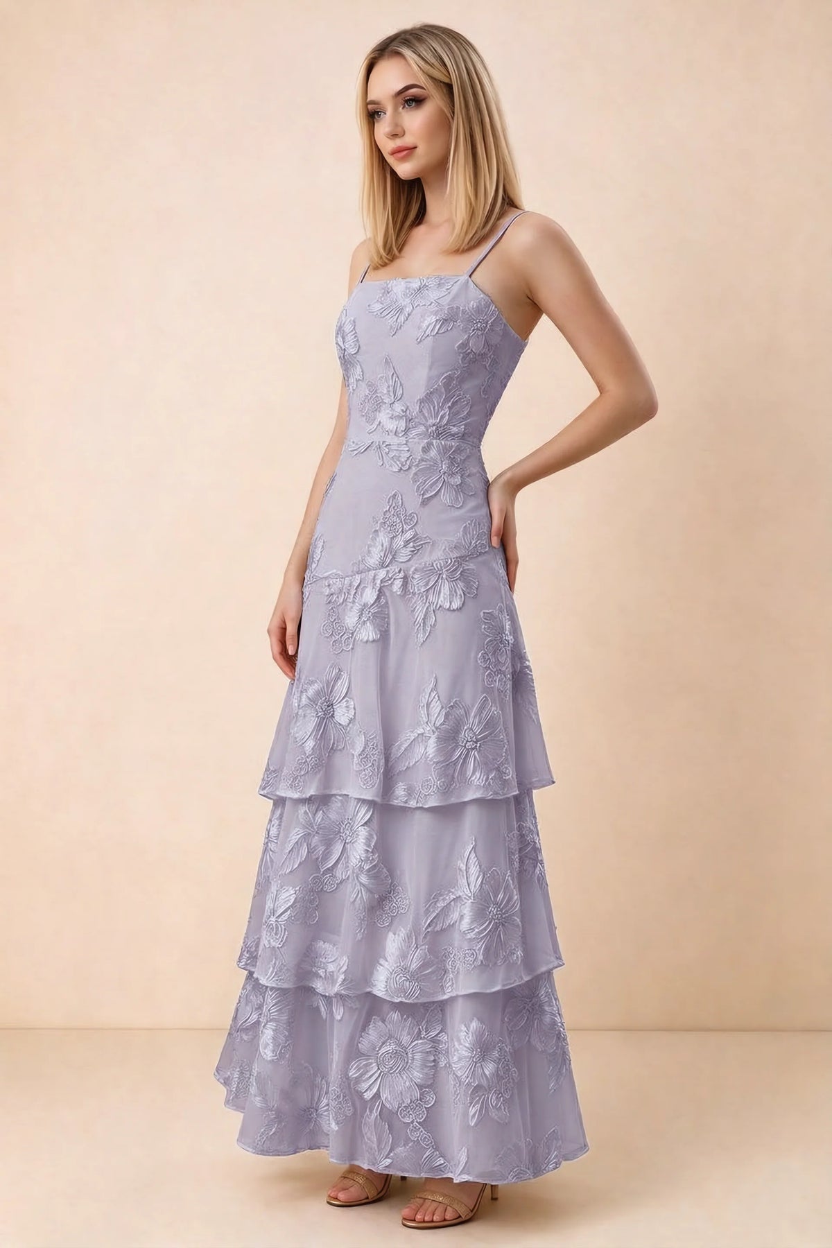 Three-quarter studio view of Bonnie pale purple dress showing the fitted waist and flared ruffle tiers