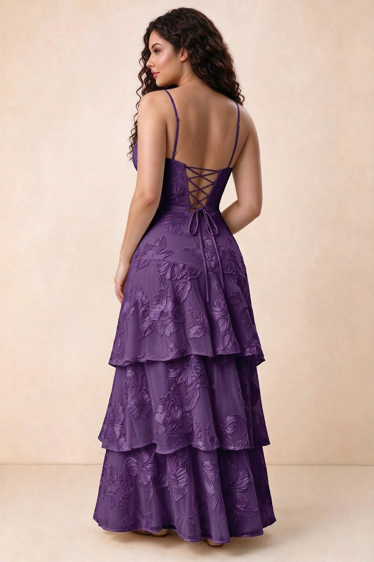 Rear studio view of Bonnie plum dress showing three overlapping tiers and an ankle-length hem