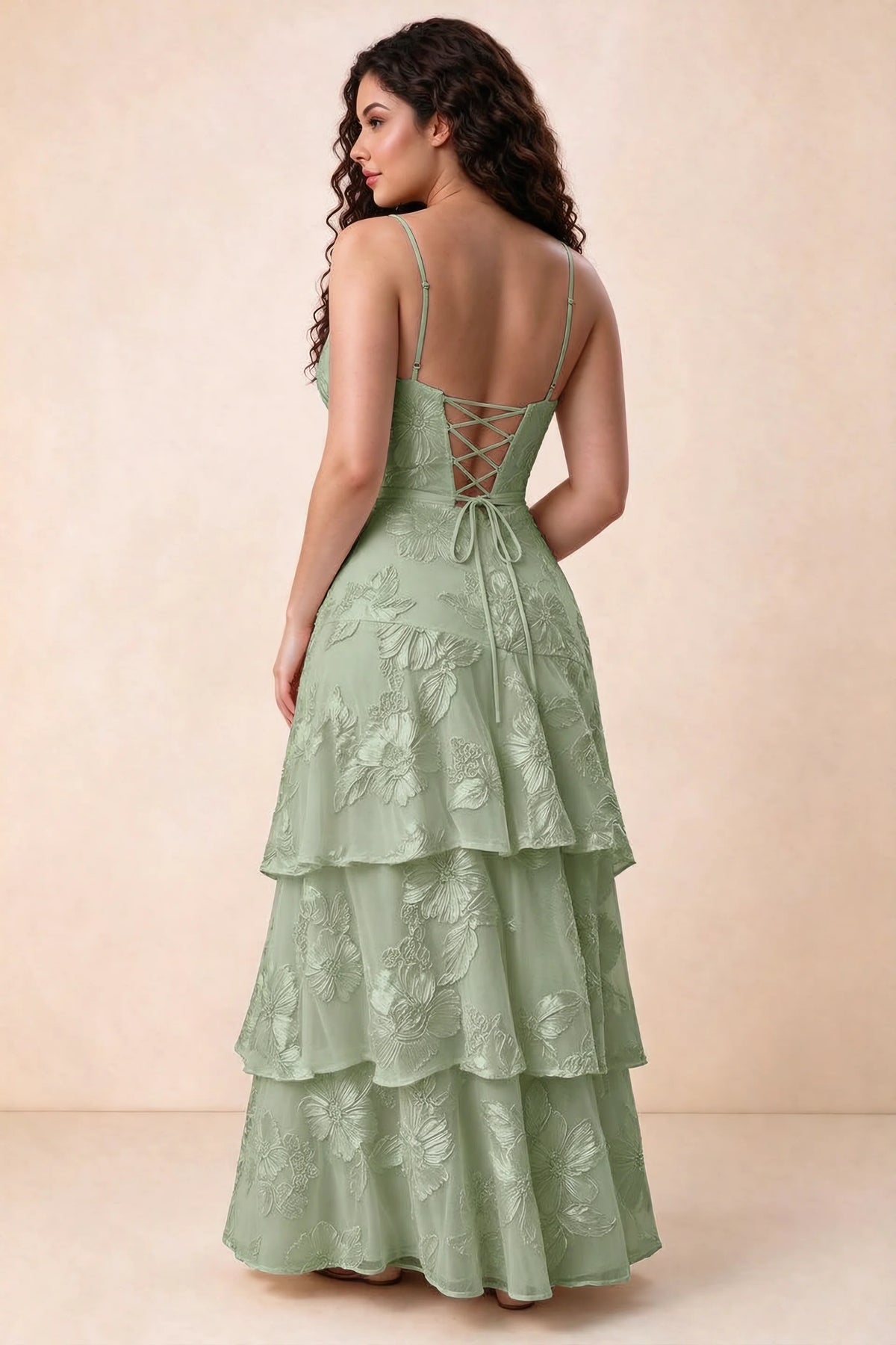 Rear studio view of Bonnie sage green dress showing three overlapping tiers and an ankle-length hem