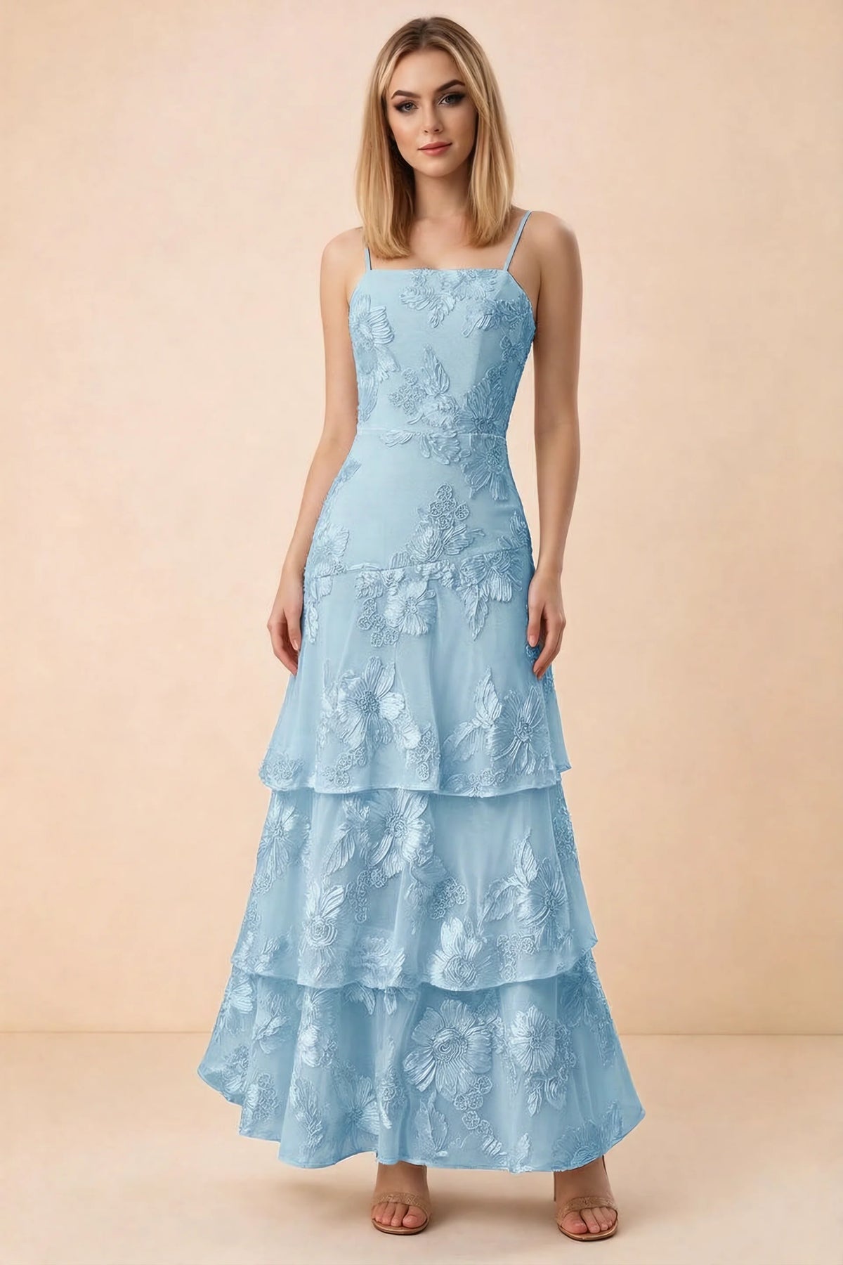 Front studio view of Bonnie sky blue floral lace maxi dress with thin straps and three ruffle tiers