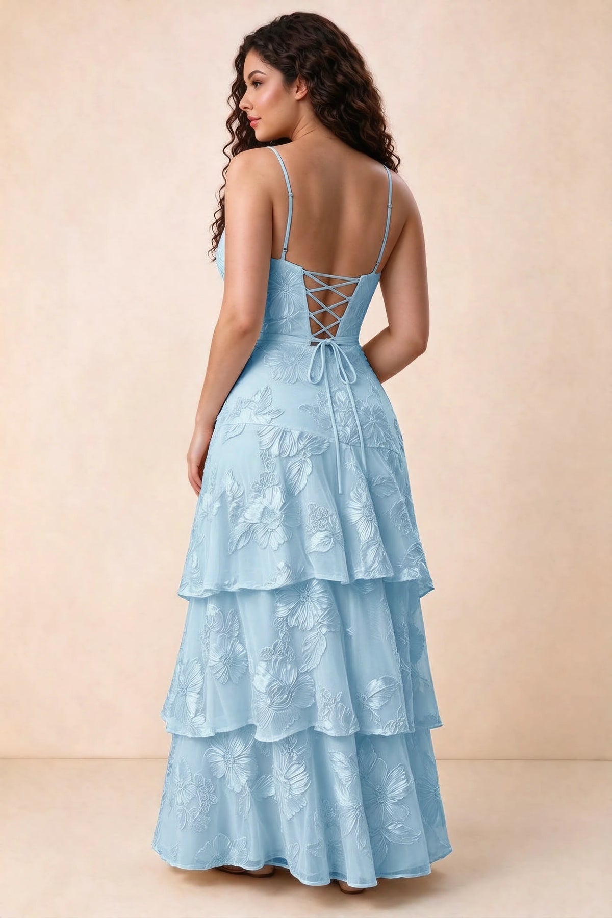 Rear studio view of Bonnie sky blue dress showing three overlapping tiers and an ankle-length hem
