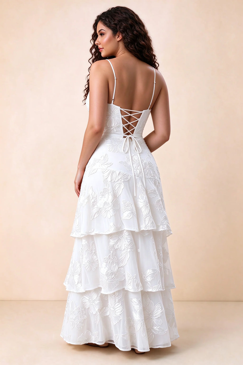 Rear studio view of Bonnie white dress showing three overlapping tiers and an ankle-length hem