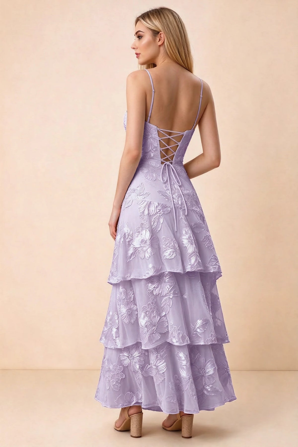 Rear studio view of Bonnie wisteria dress showing adjustable straps, back lacing and tiered ruffles