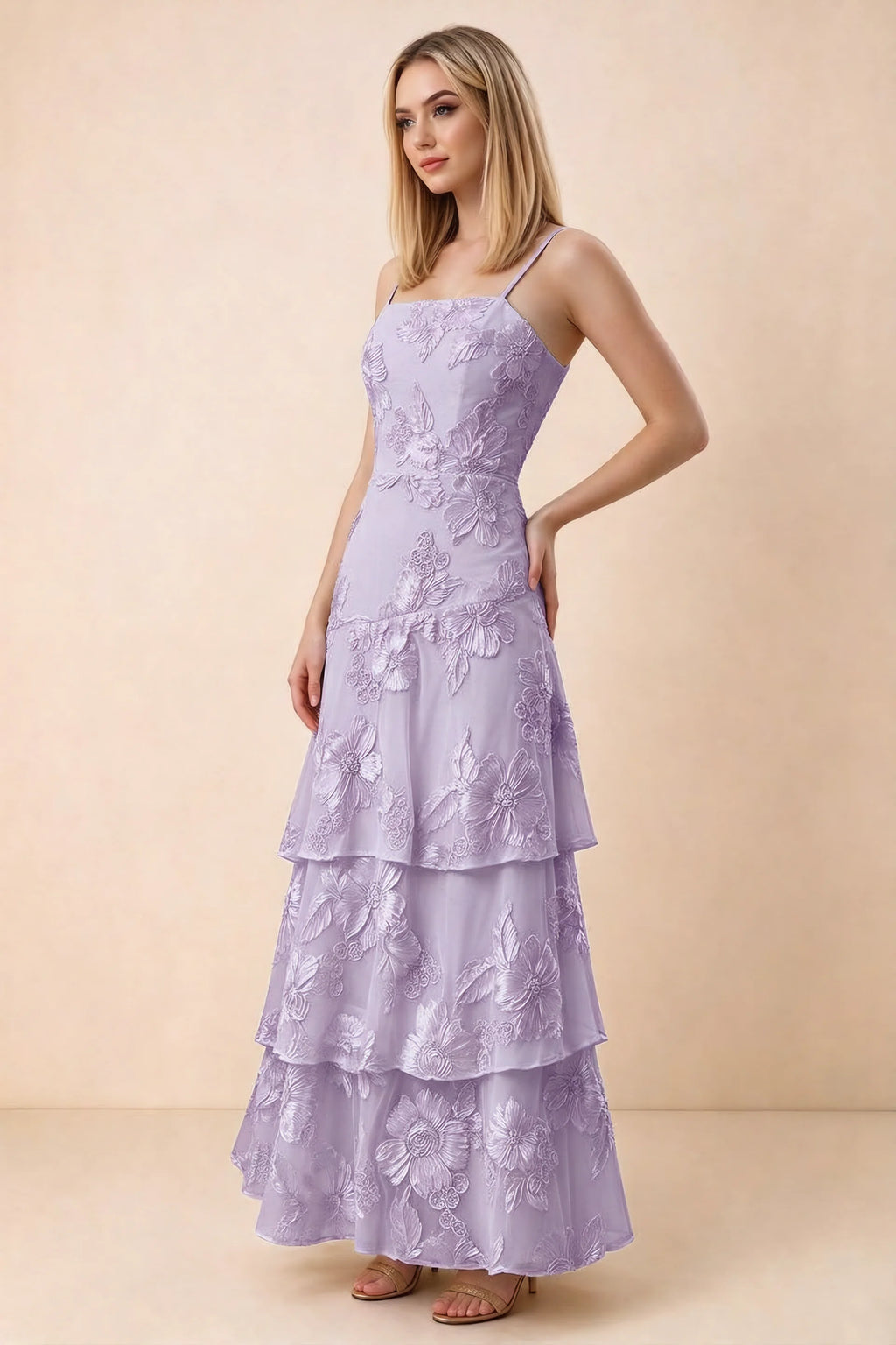 Three-quarter studio view of Bonnie wisteria dress showing the fitted waist and flared ruffle tiers