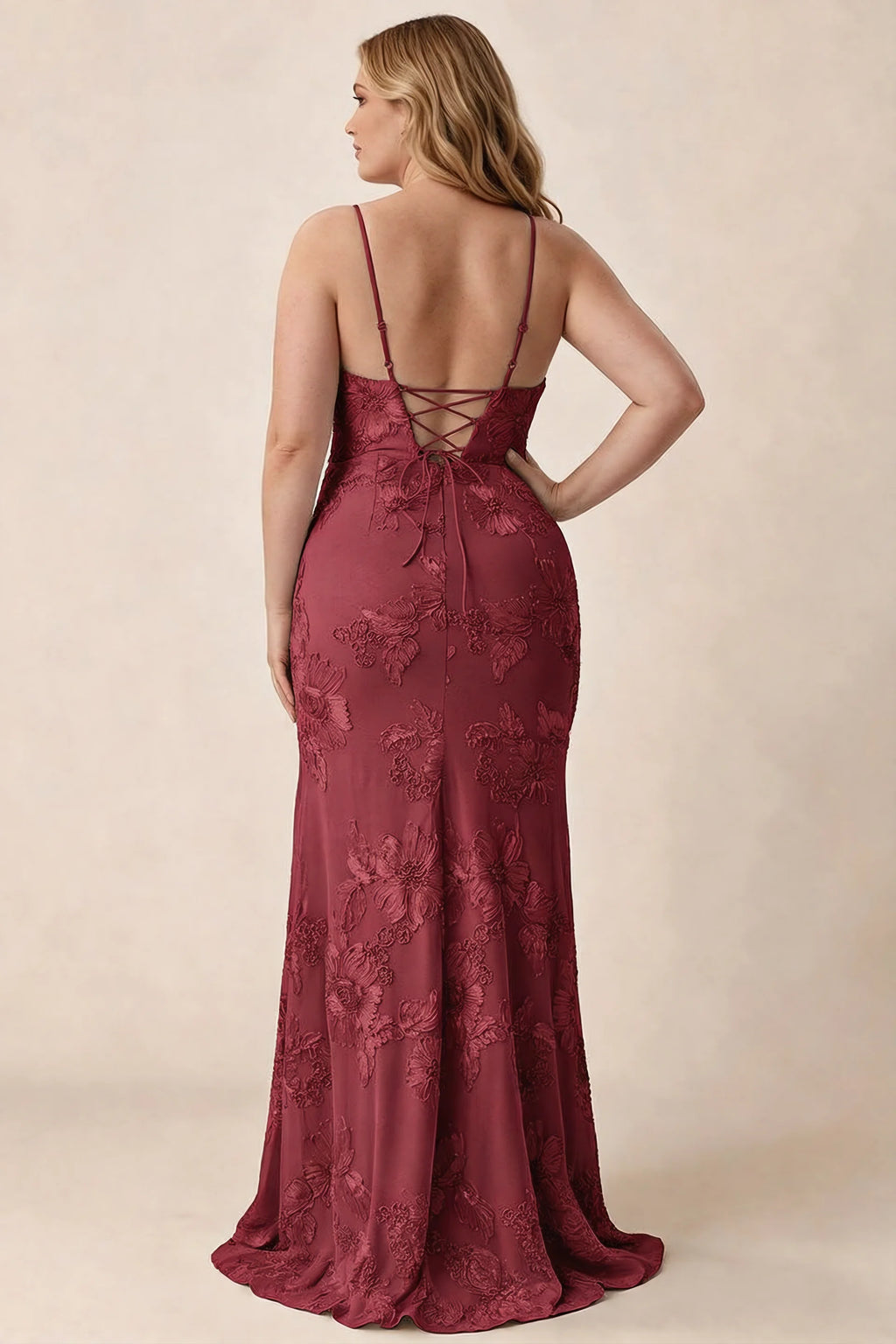 Rear studio view of Brianna burgundy floral dress showing the fitted hips and long hem