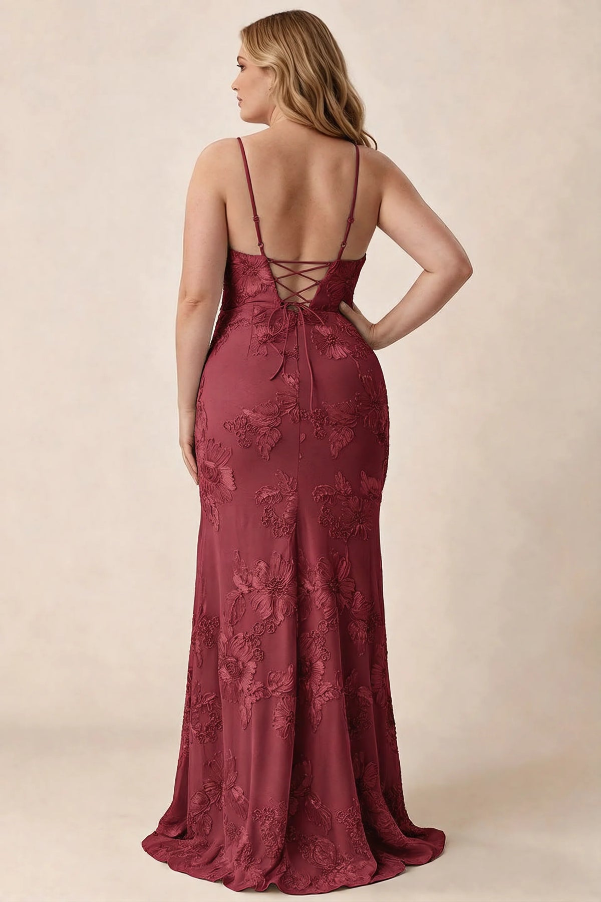 Rear studio view of Brianna burgundy floral dress showing the fitted hips and long hem