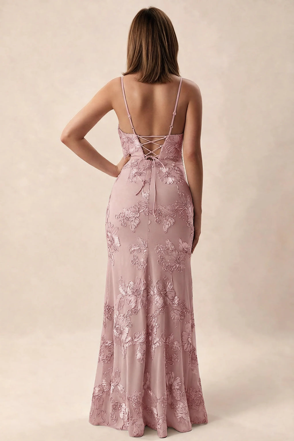 Rear studio view of Brianna dusty lilac dress showing adjustable shoulder straps and crossed back lacing