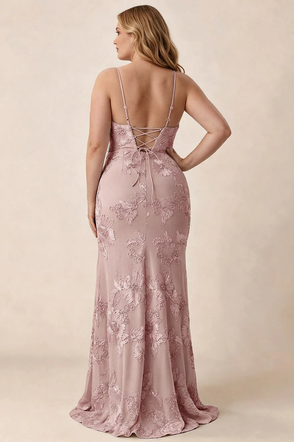 Rear studio view of Brianna dusty lilac floral dress showing the fitted hips and long hem