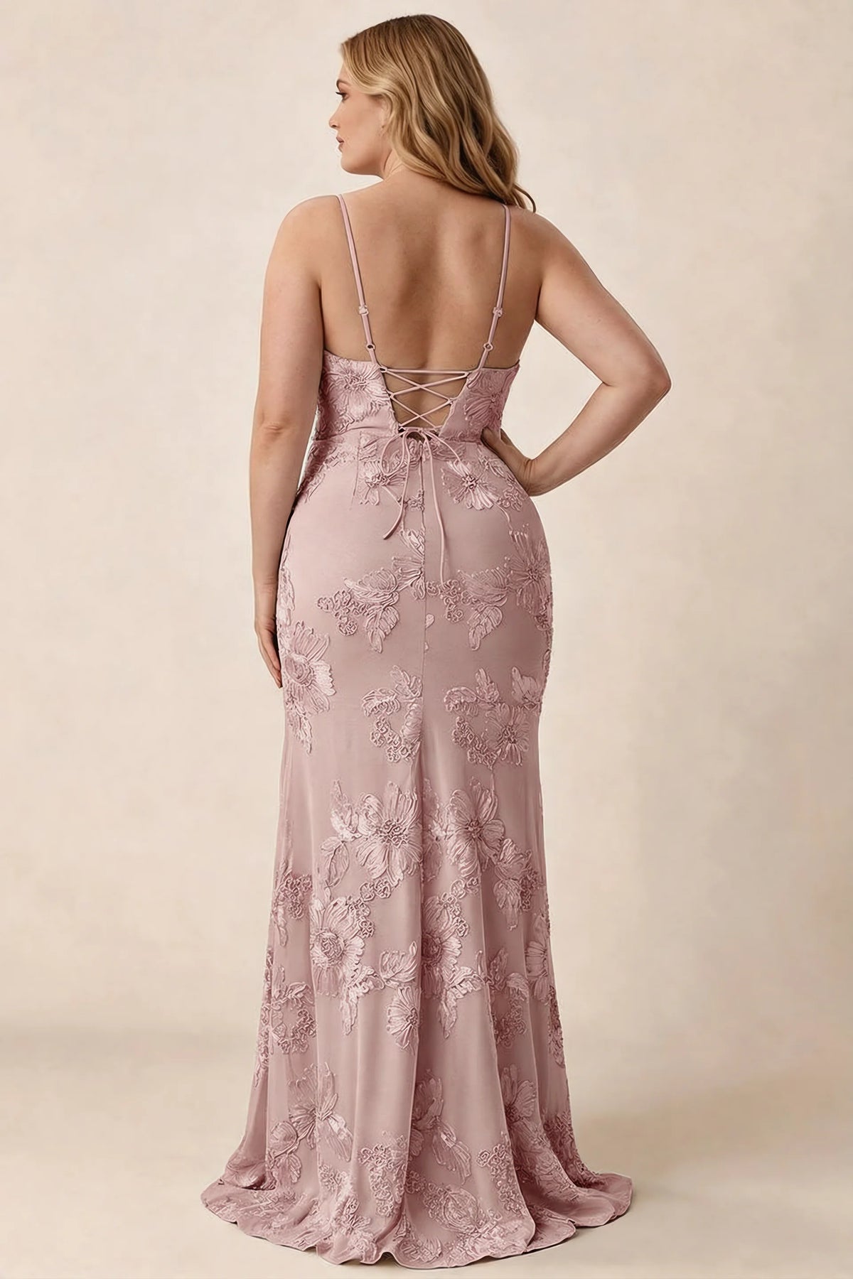 Rear studio view of Brianna dusty lilac floral dress showing the fitted hips and long hem
