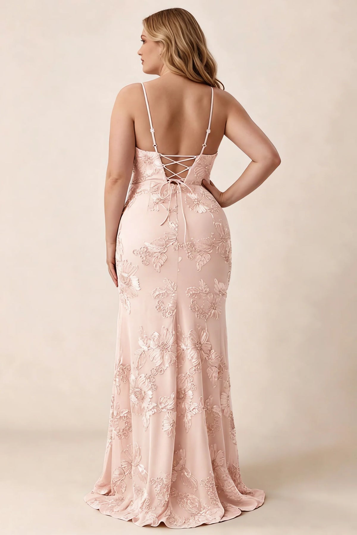 Rear studio view of Brianna light pink floral dress showing the fitted hips and long hem