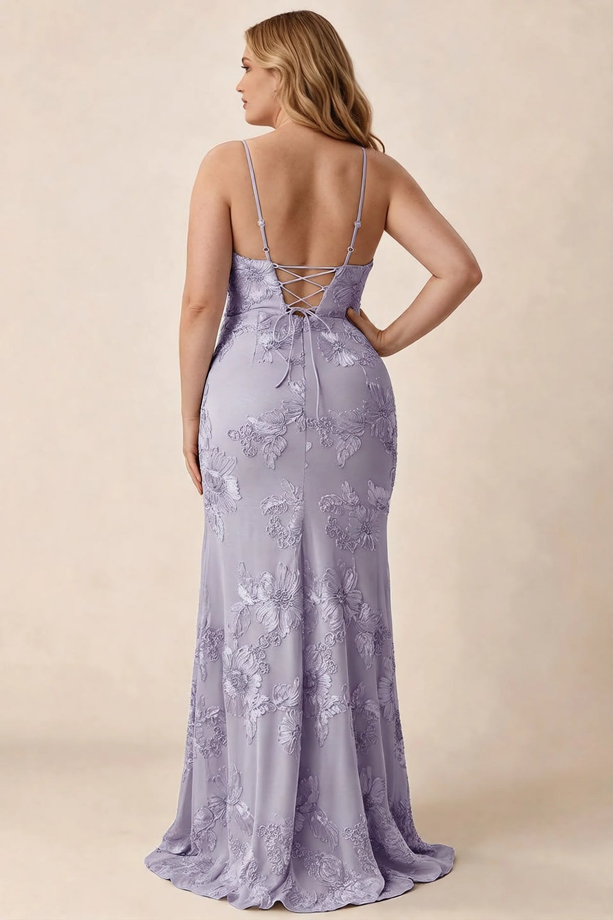 Rear studio view of Brianna pale purple floral dress showing the fitted hips and long hem
