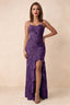 Front studio view of Brianna plum floral maxi dress with thin straps and a high ruffle-edged opening