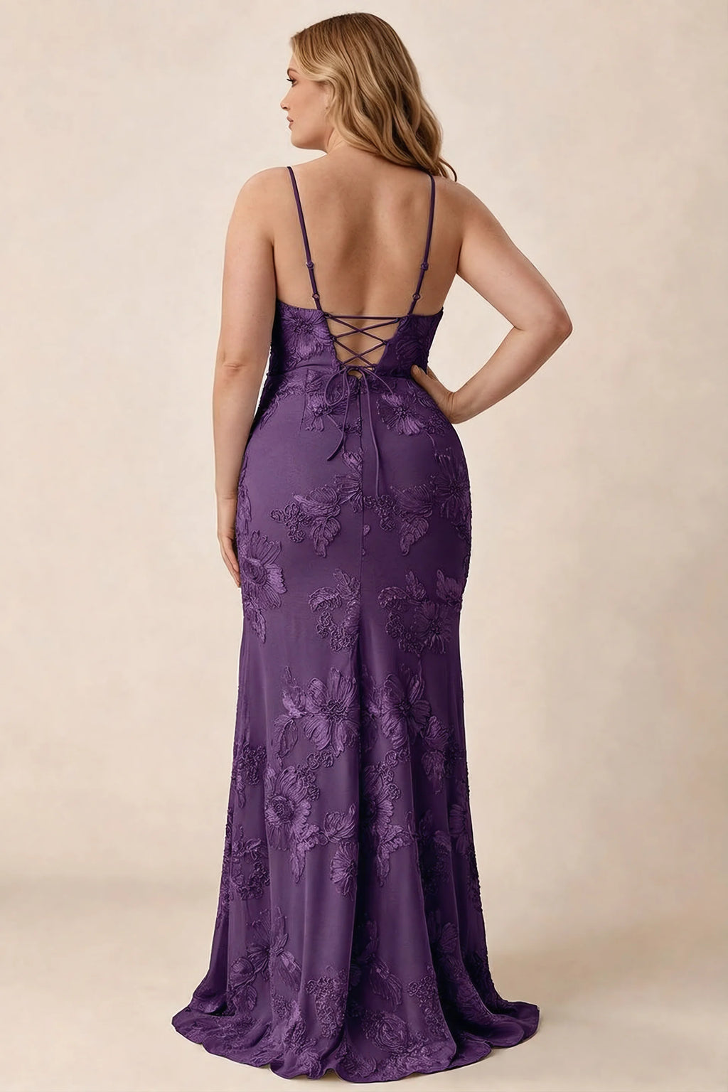 Rear studio view of Brianna plum floral dress showing the fitted hips and long hem