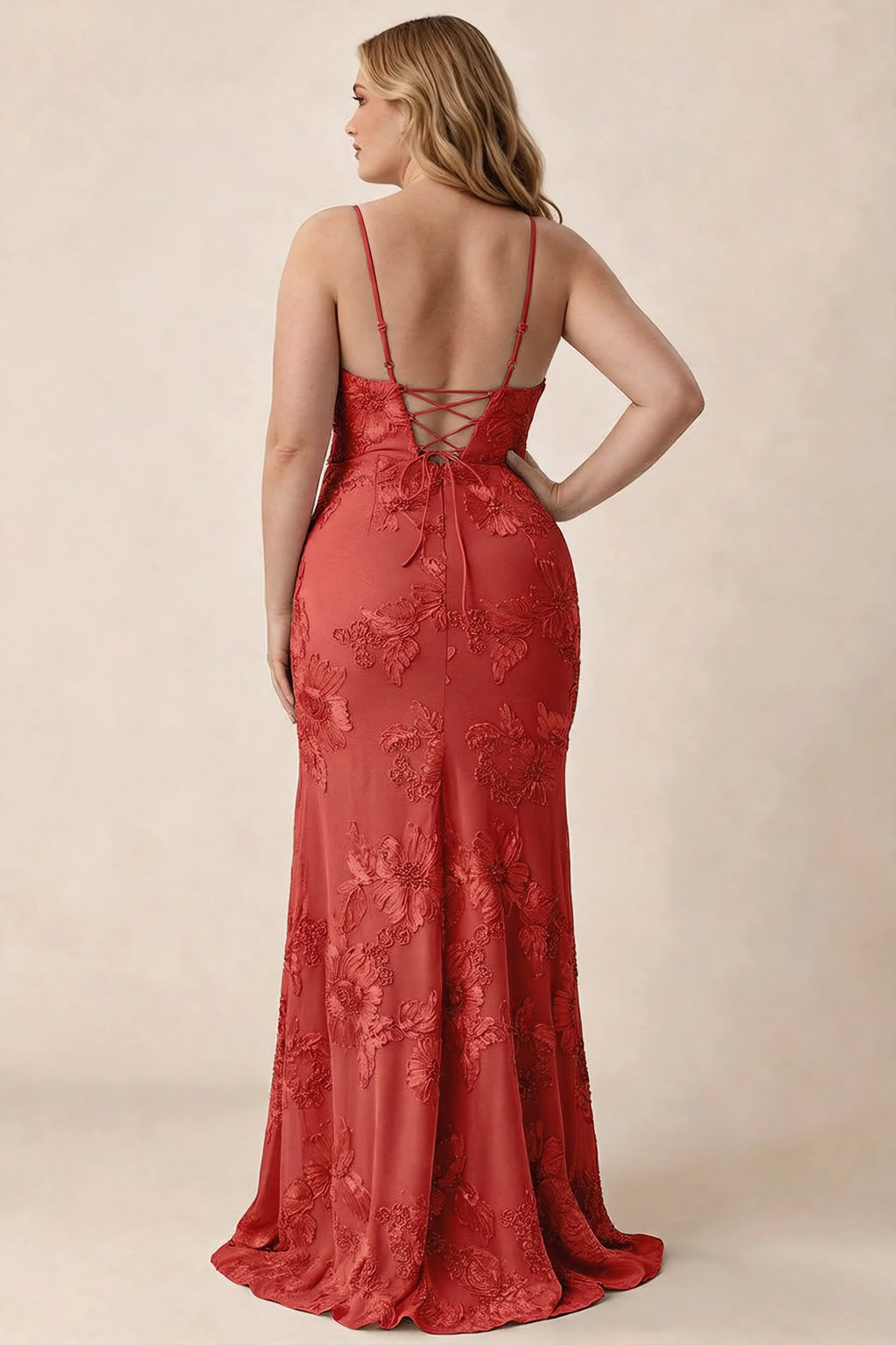 Rear studio view of Brianna red floral dress showing the fitted hips and long hem