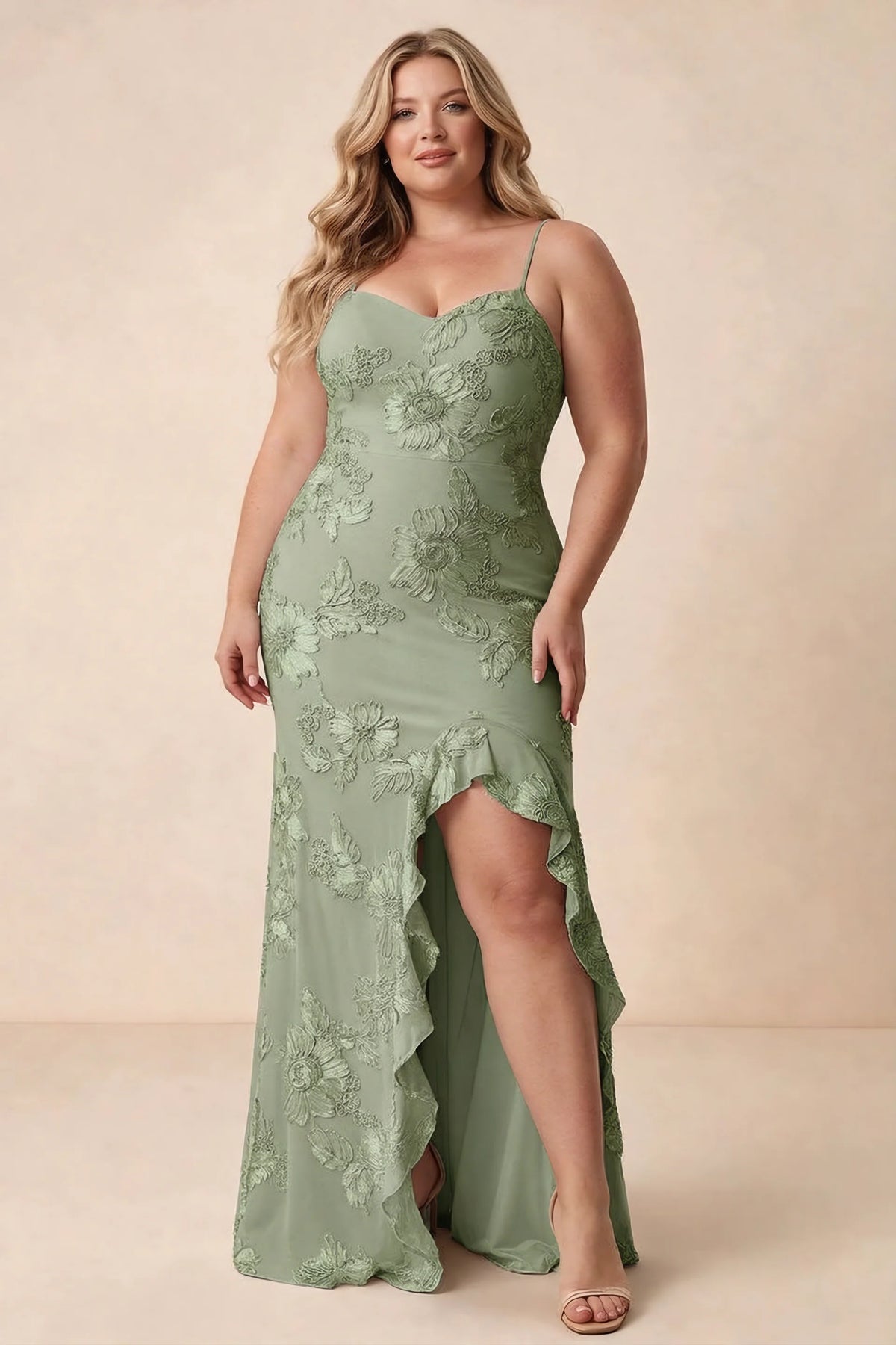 Front studio view of Brianna sage green maxi dress showing the fitted waist and ruffle-edged skirt