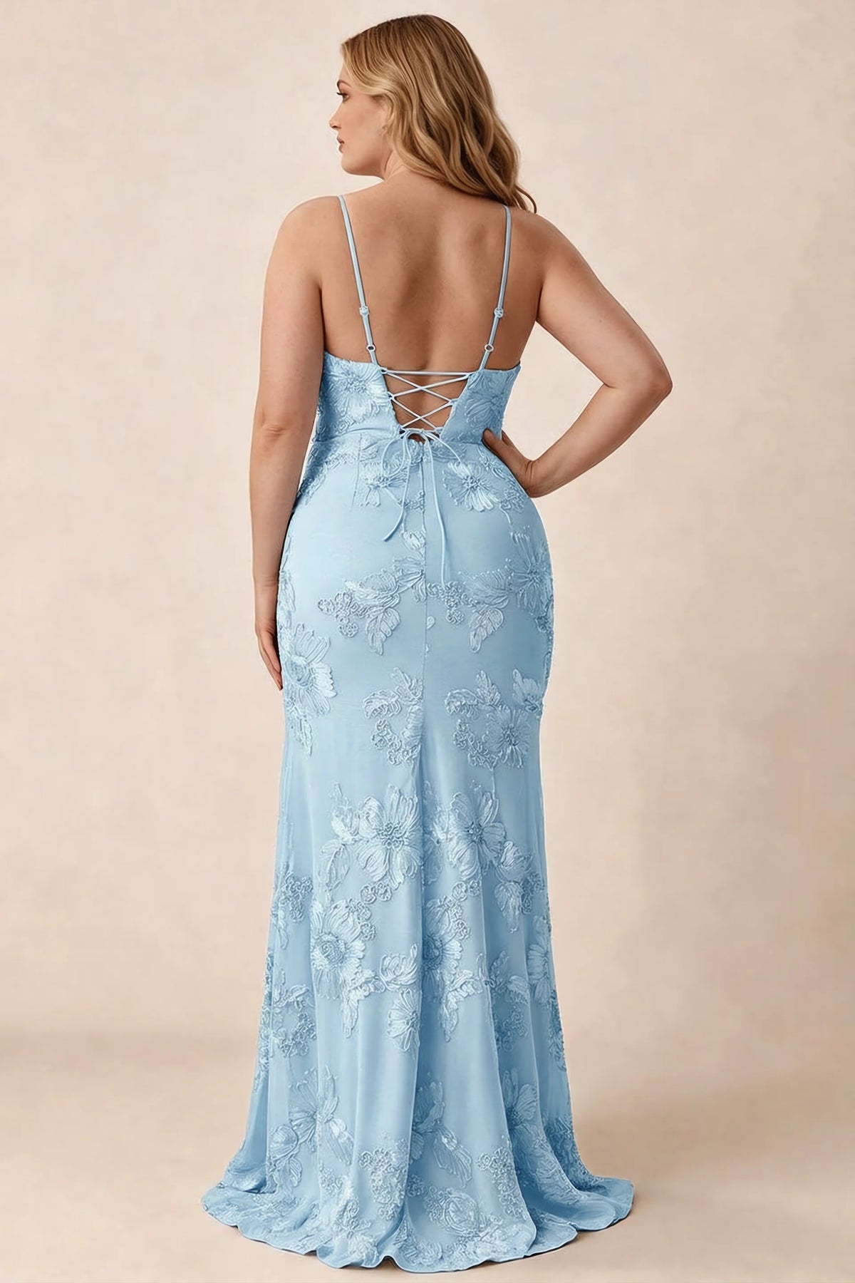 Rear studio view of Brianna sky blue floral dress showing the fitted hips and long hem