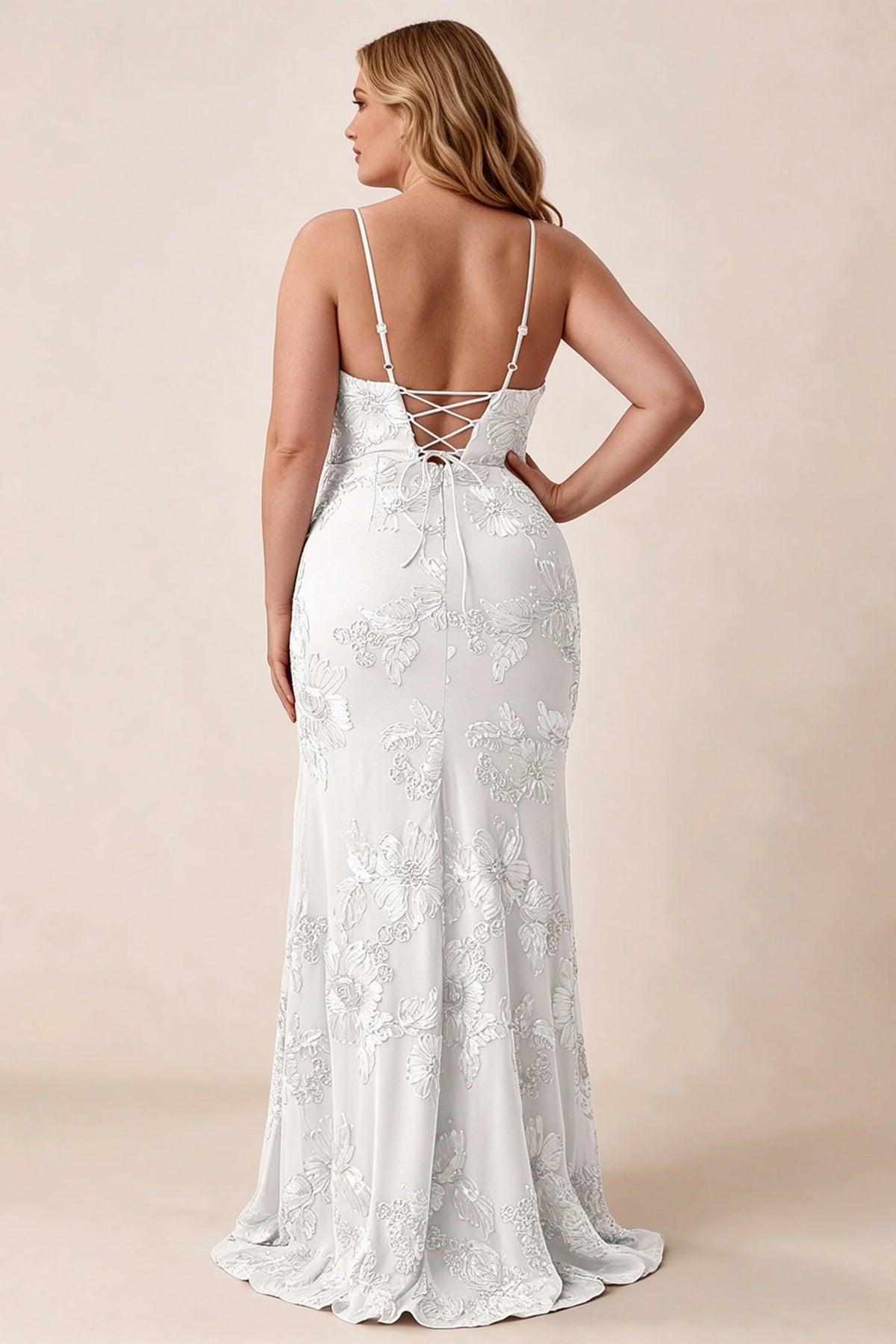 Rear studio view of Brianna white floral dress showing the fitted hips and long hem
