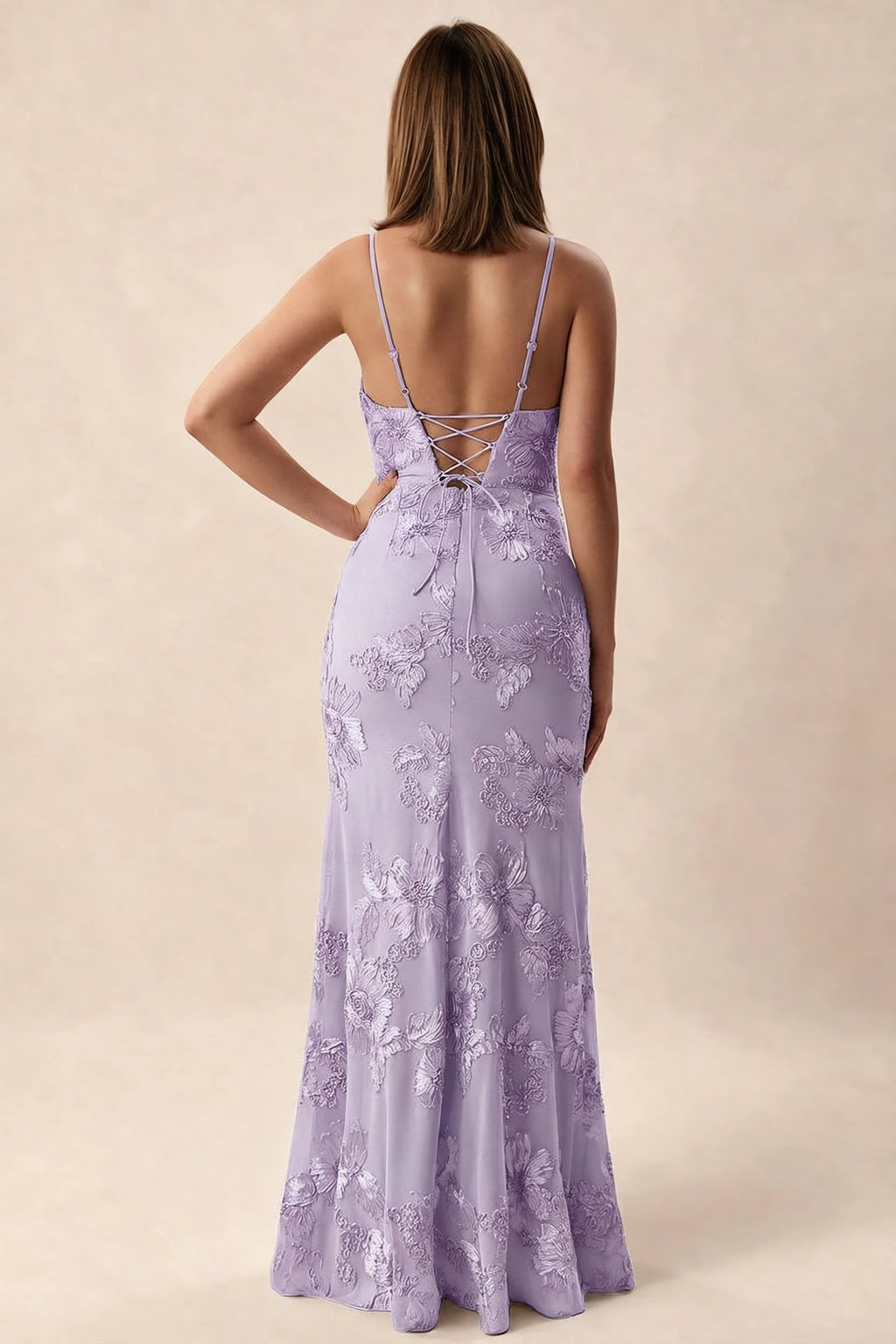 Rear studio view of Brianna wisteria dress showing adjustable shoulder straps and crossed back lacing