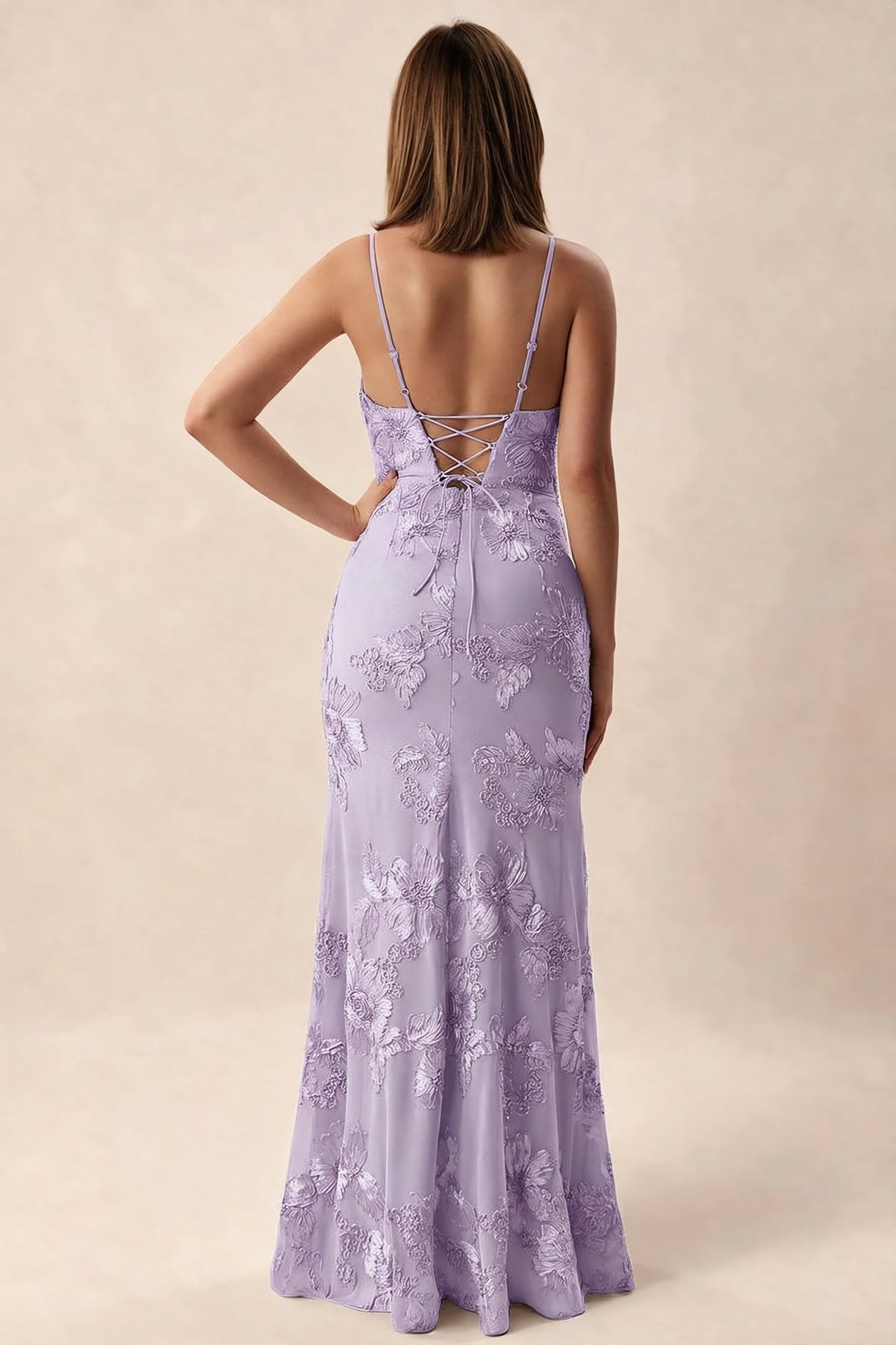 Rear studio view of Brianna wisteria dress showing adjustable shoulder straps and crossed back lacing