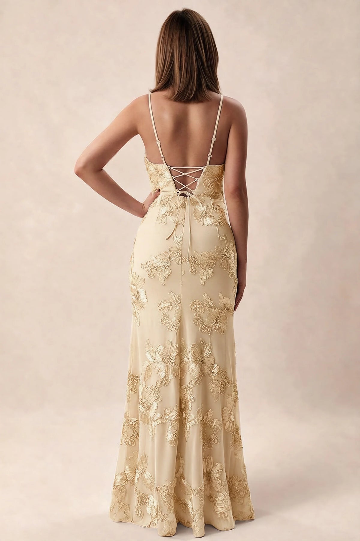 Rear studio view of Brianna yellow dress showing adjustable shoulder straps and crossed back lacing