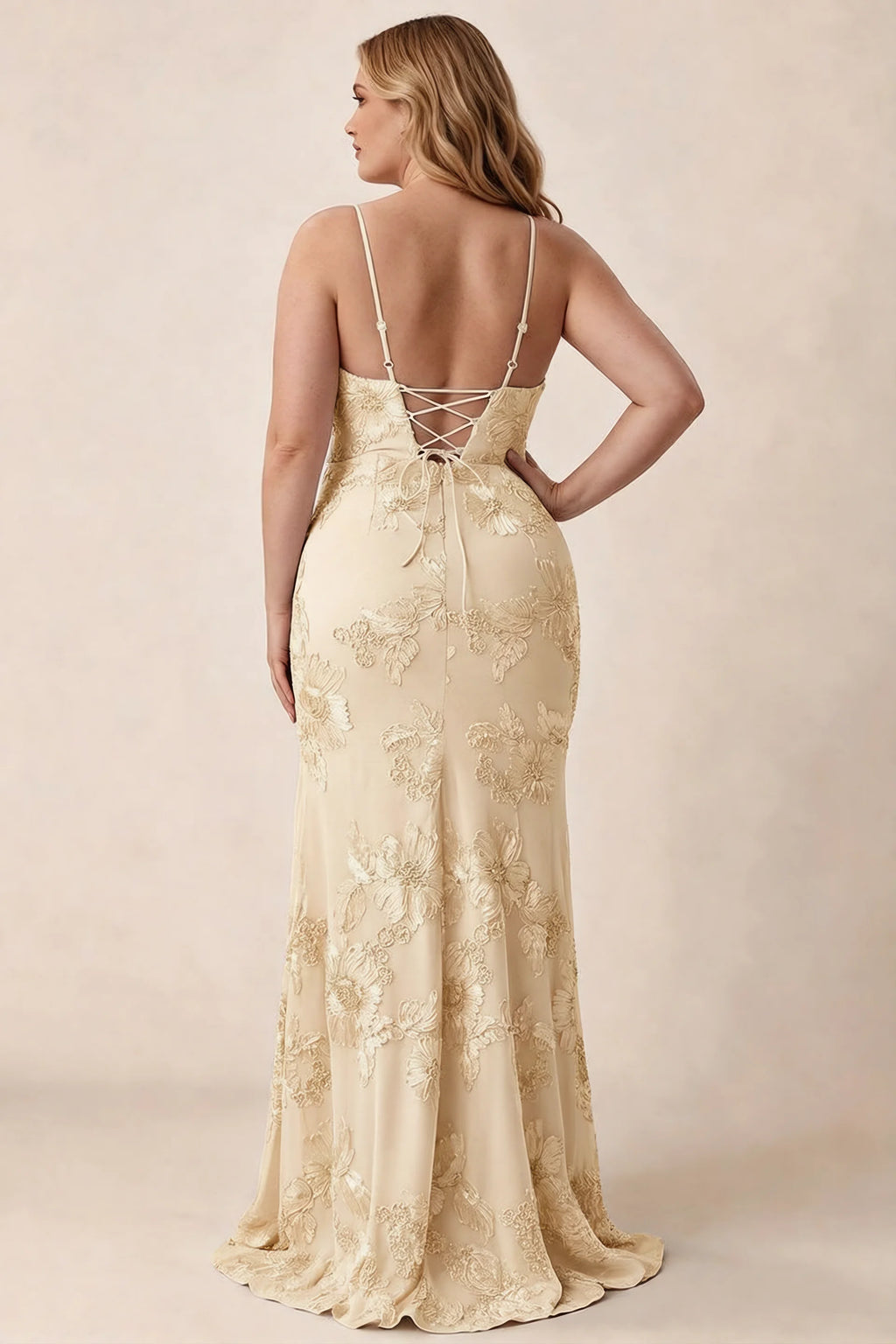 Rear studio view of Brianna yellow floral dress showing the fitted hips and long hem