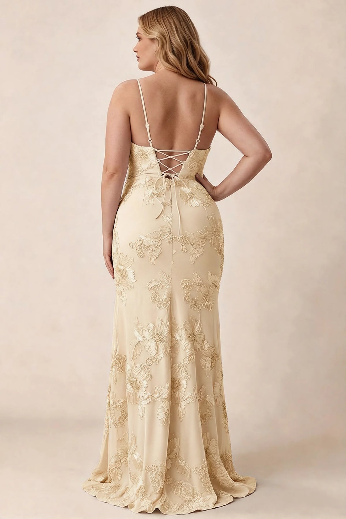 Rear studio view of Brianna yellow floral dress showing the fitted hips and long hem