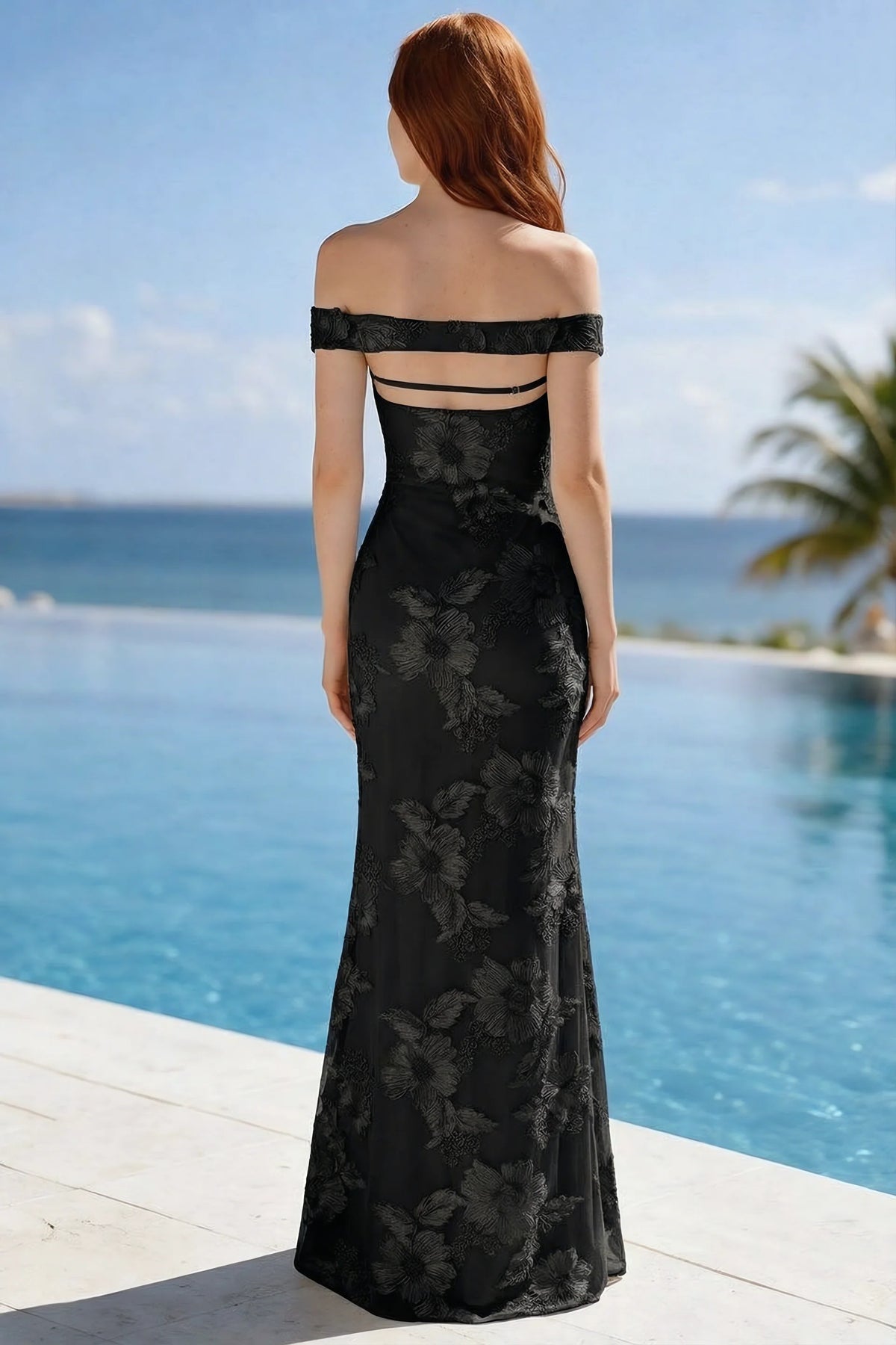 Poolside rear view of Bridgette black dress showing the open upper back and long hem