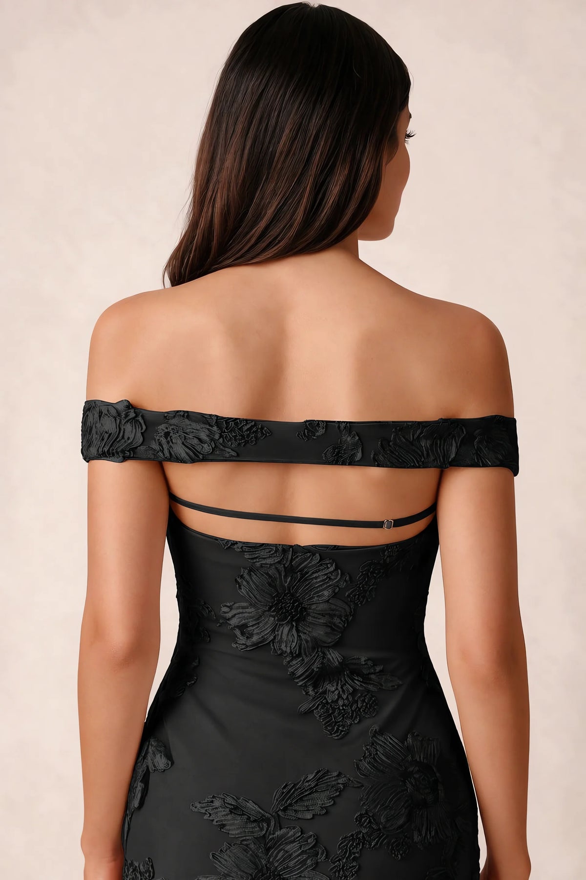 Close-up of Bridgette black open back framed by the shoulder band and slim horizontal strap