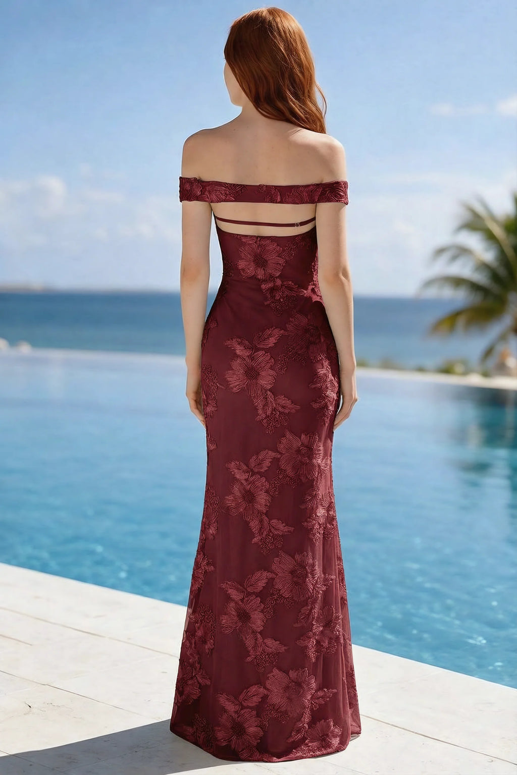 Poolside rear view of Bridgette burgundy dress showing the open upper back and long hem