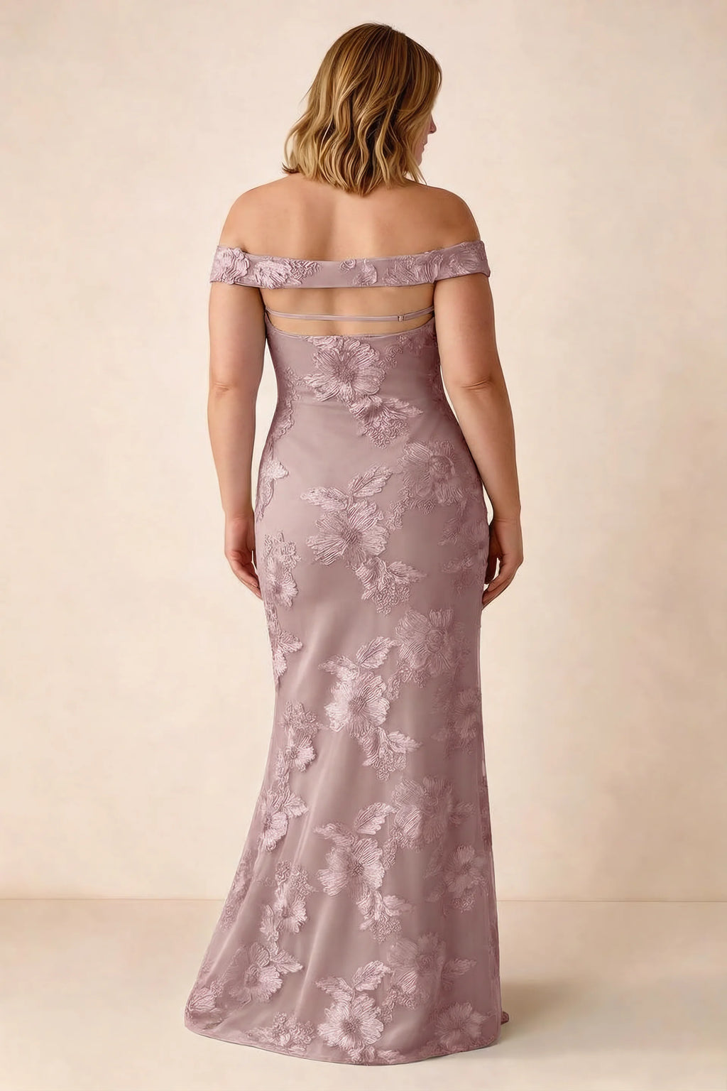 Rear studio view of Bridgette dusty lilac dress on a second model, showing the flared skirt