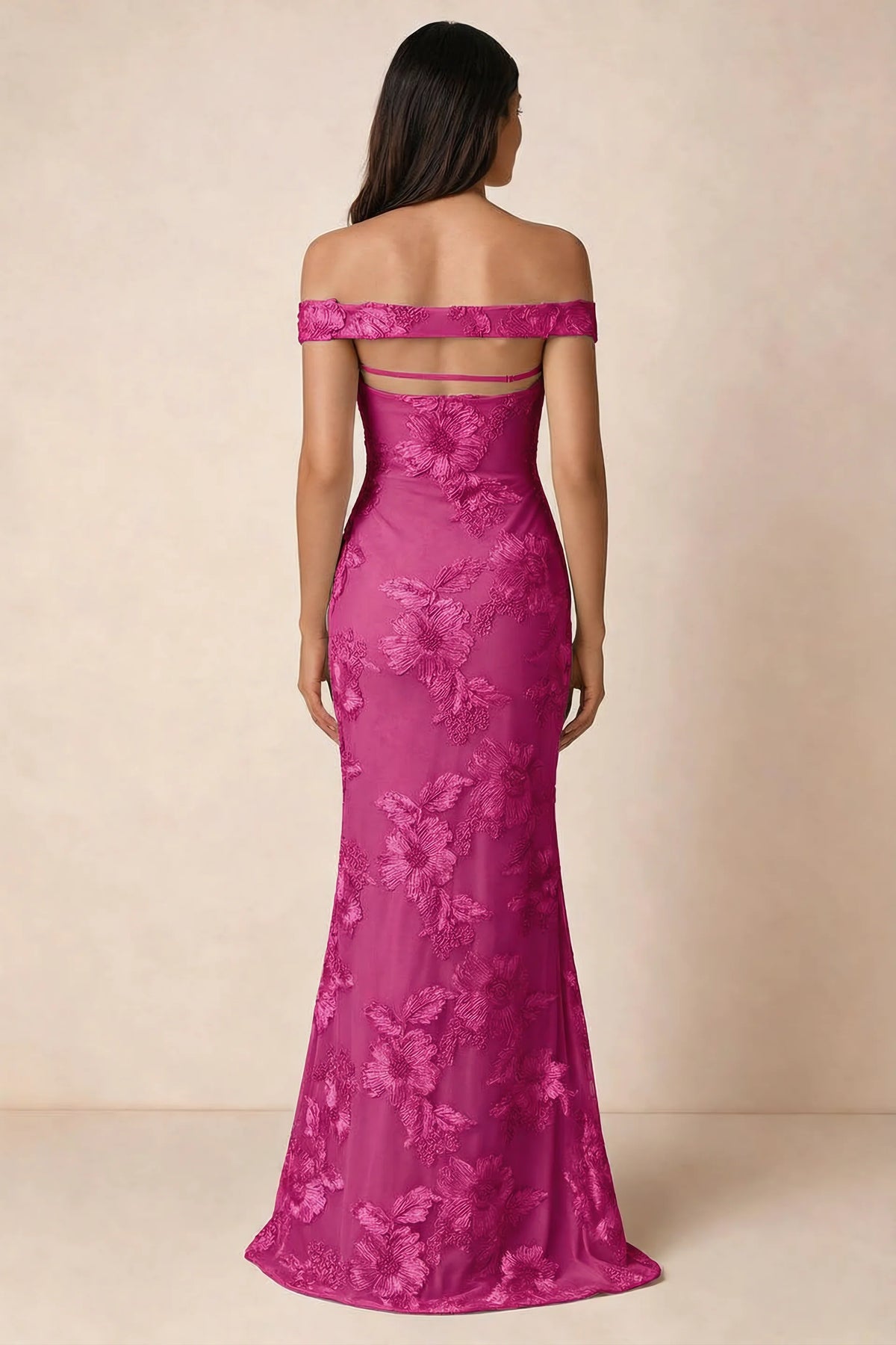 Rear studio view of Bridgette fuchsia dress showing the horizontal straps across the open upper back