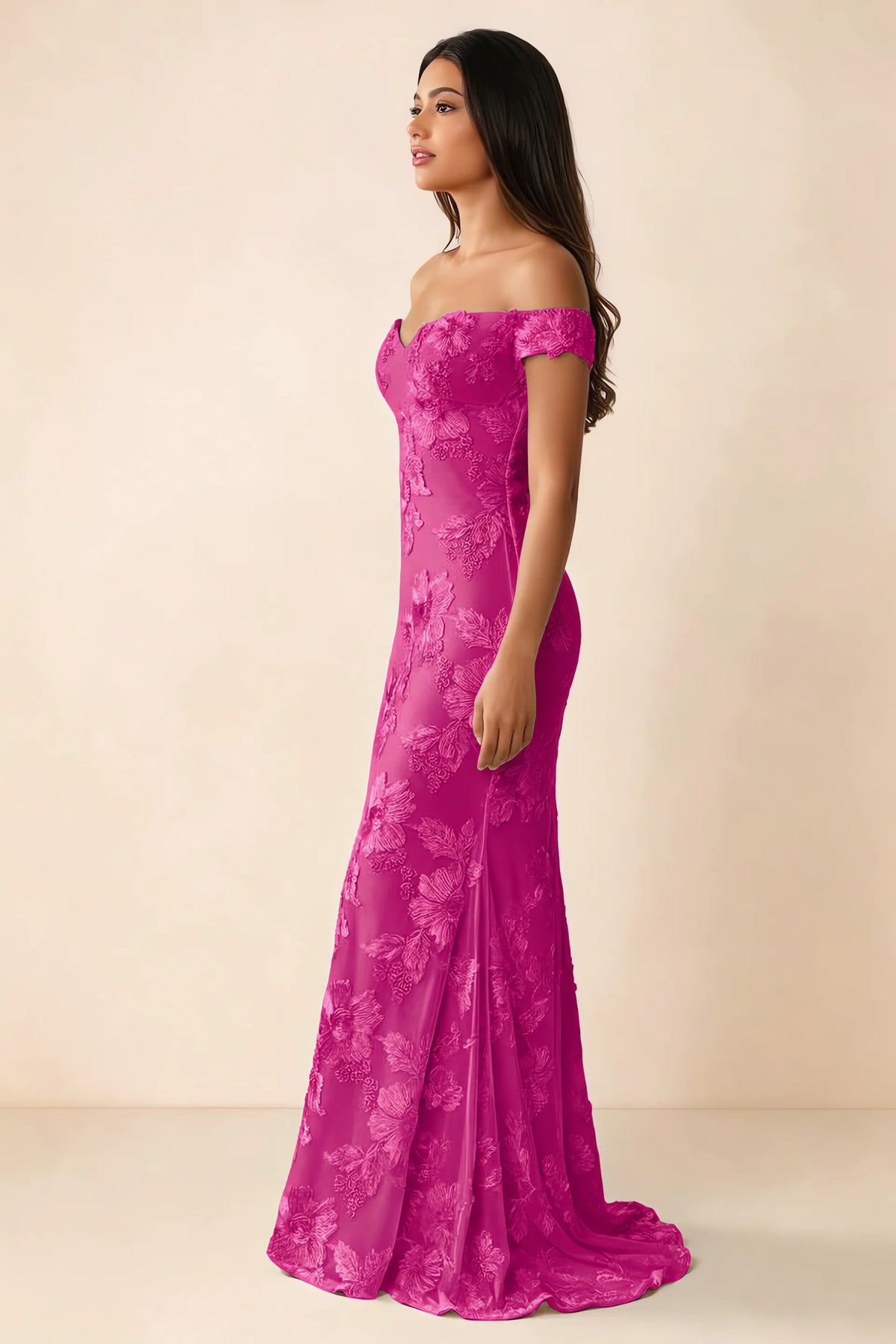 Side studio view of Bridgette fuchsia dress showing the fitted hips and trailing back hem