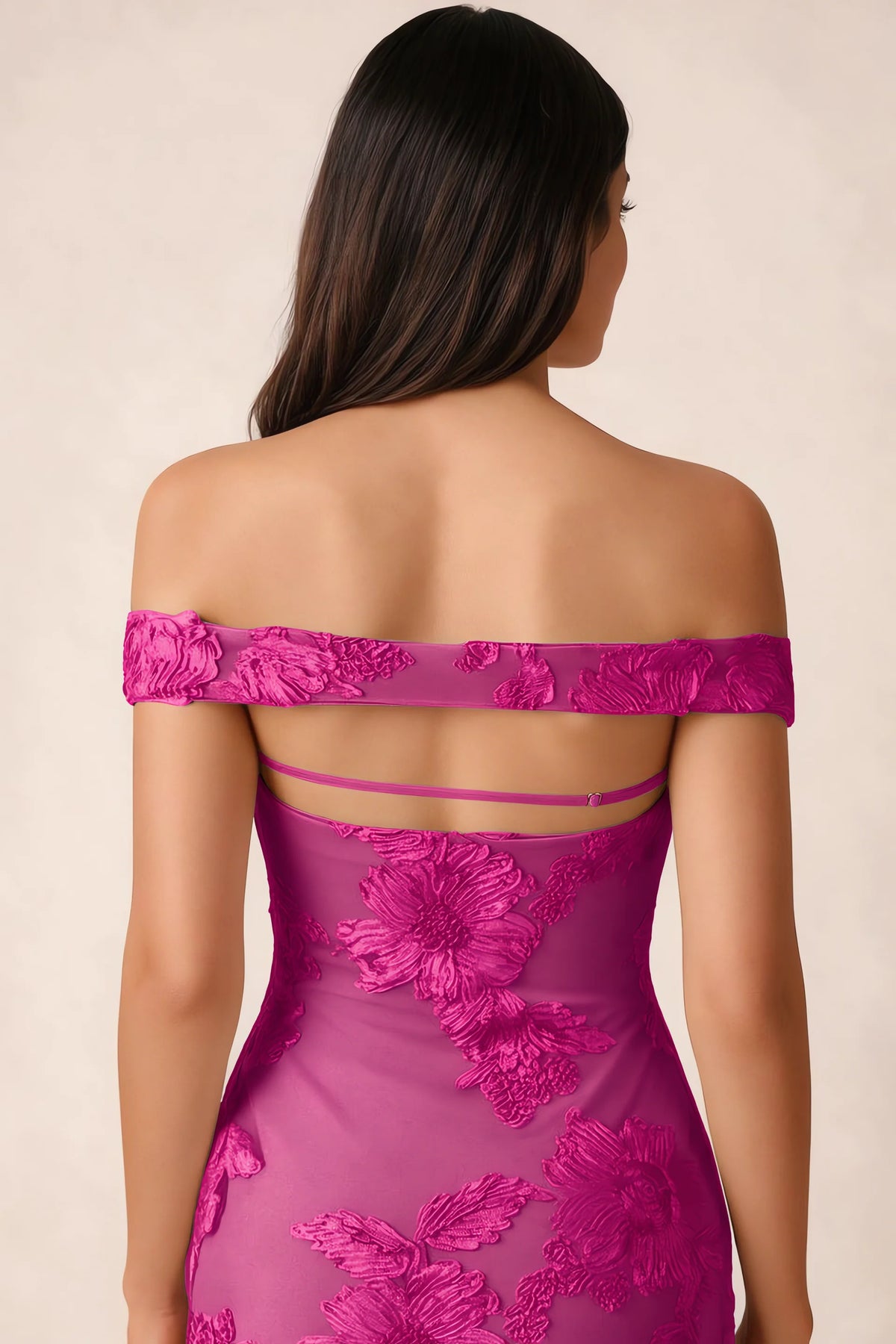 Close-up of Bridgette fuchsia open back framed by the shoulder band and slim horizontal strap