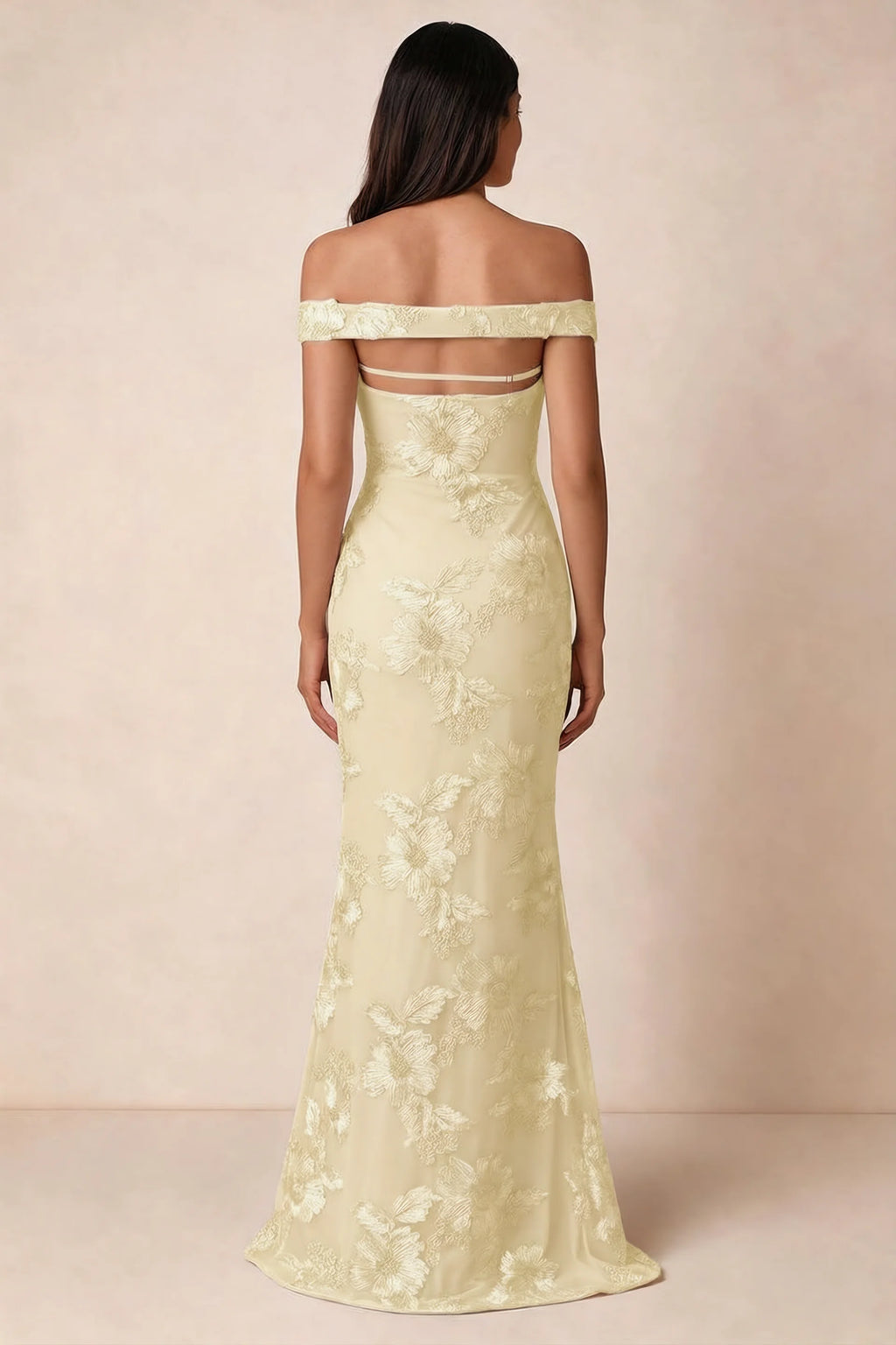 Rear studio view of Bridgette lemon dress showing the horizontal straps across the open upper back