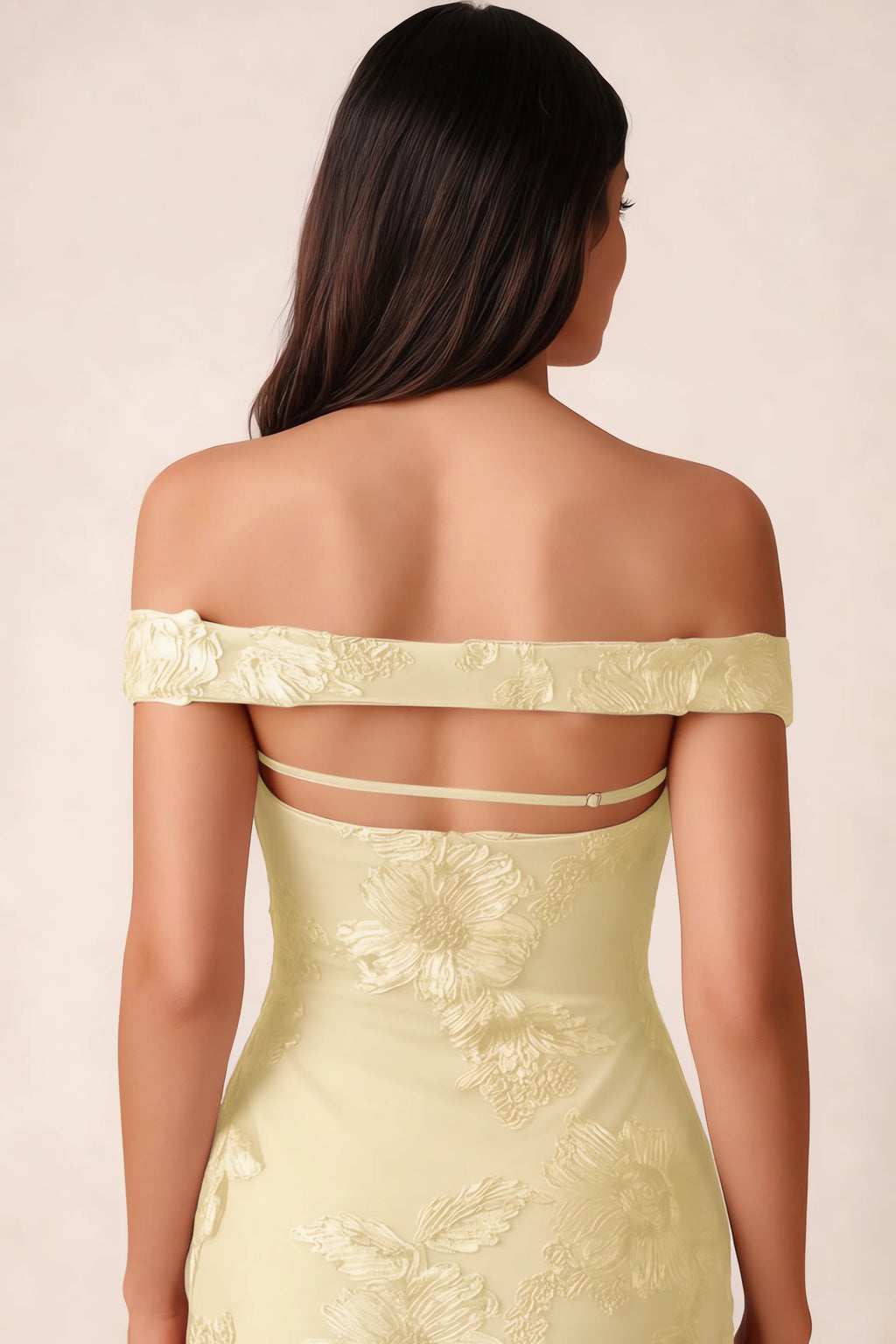 Close-up of Bridgette lemon open back framed by the shoulder band and slim horizontal strap