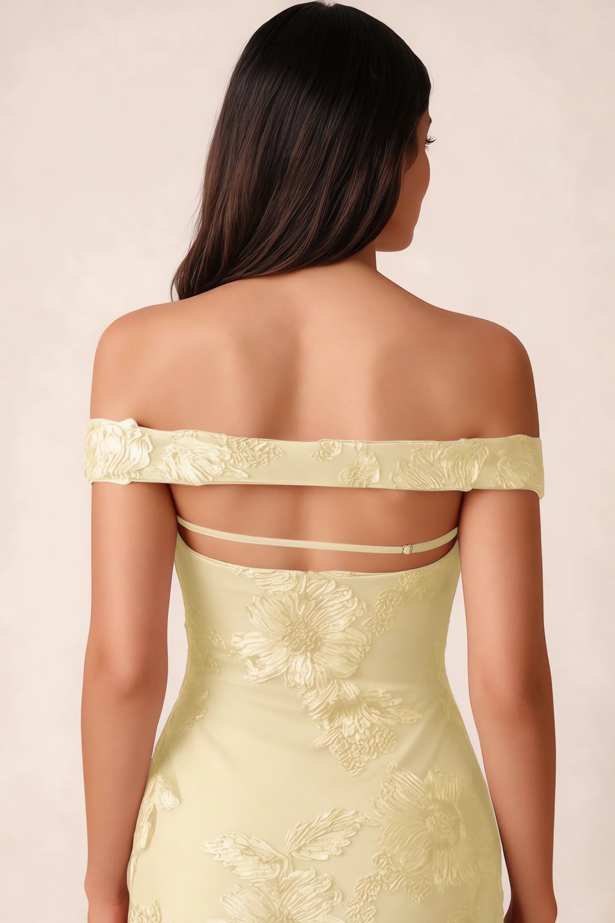 Close-up of Bridgette lemon open back framed by the shoulder band and slim horizontal strap