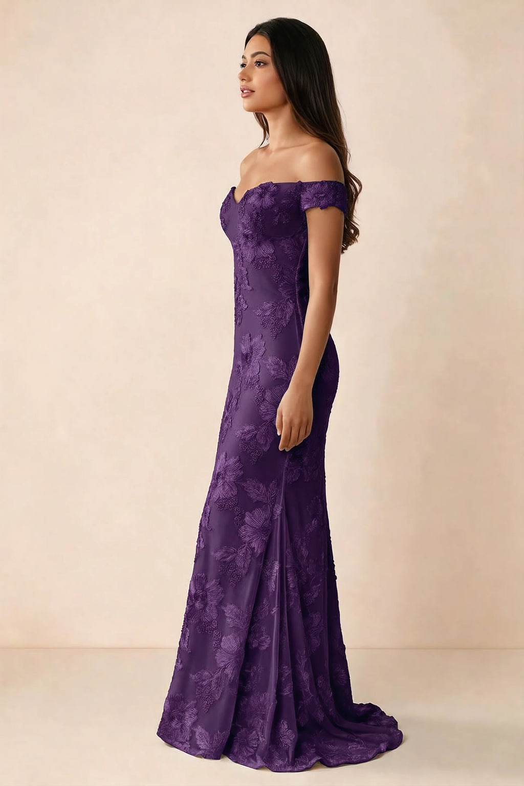 Side studio view of Bridgette plum dress showing the fitted hips and trailing back hem