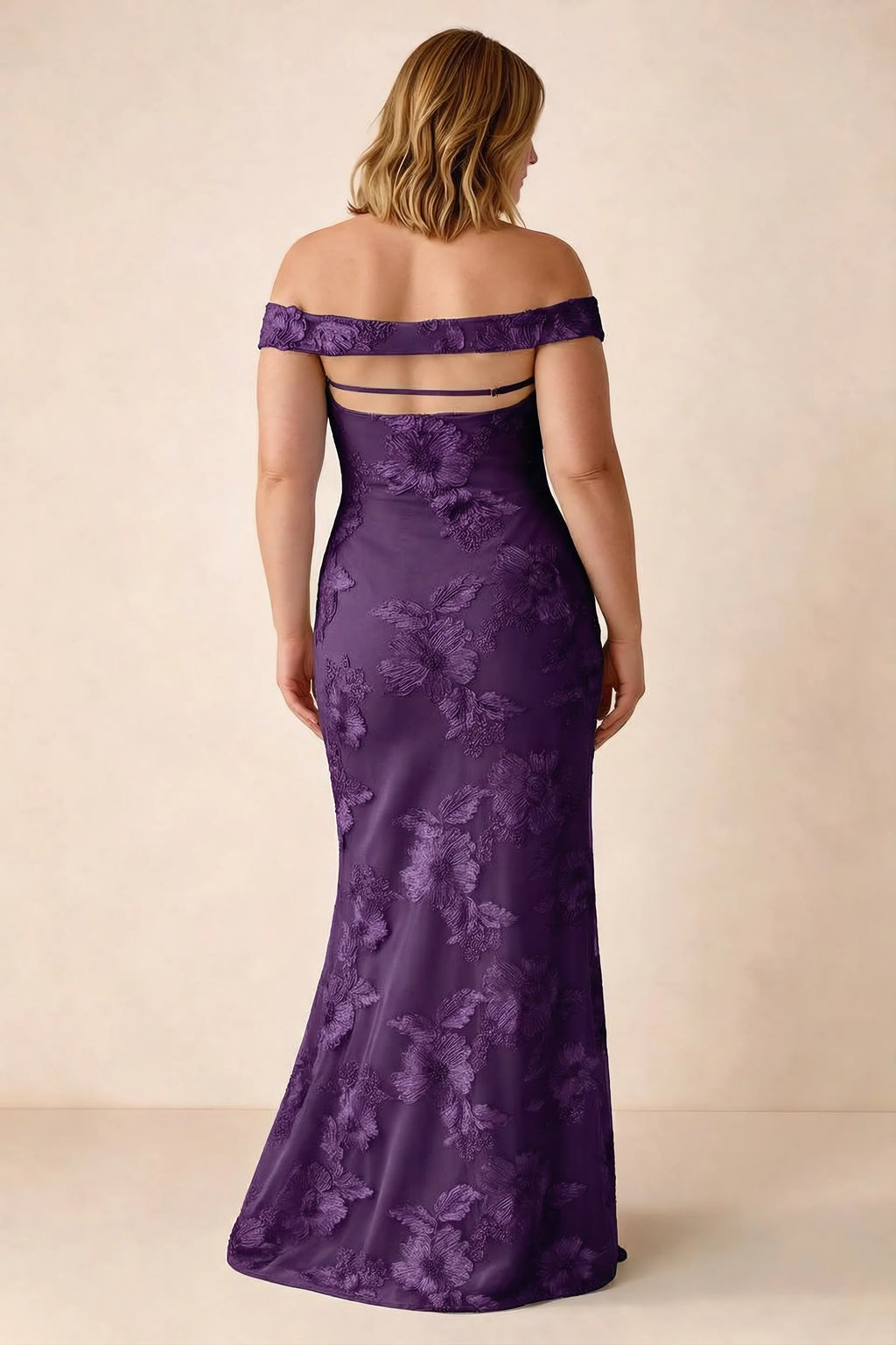 Rear studio view of Bridgette plum dress on a second model, showing the flared skirt