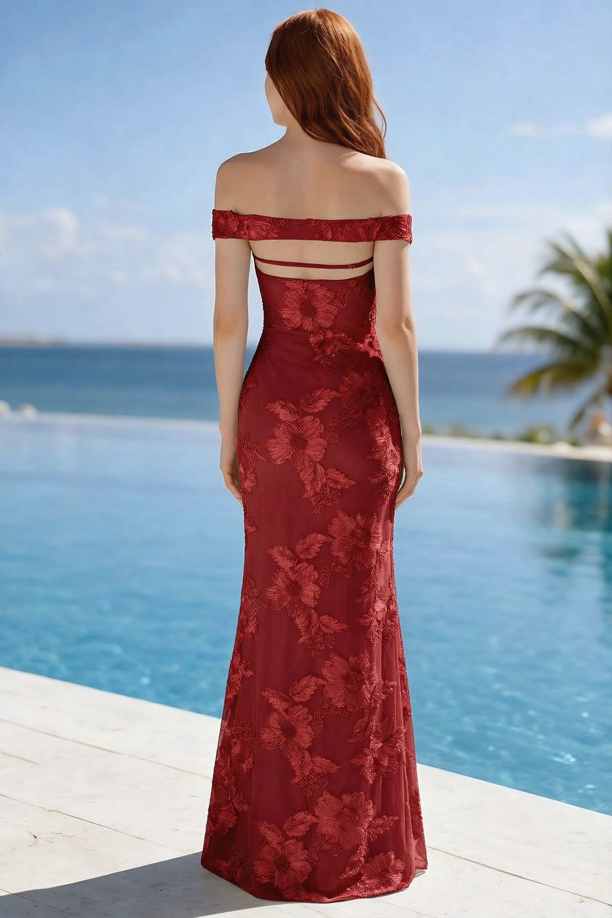 Poolside rear view of Bridgette red dress showing the open upper back and long hem
