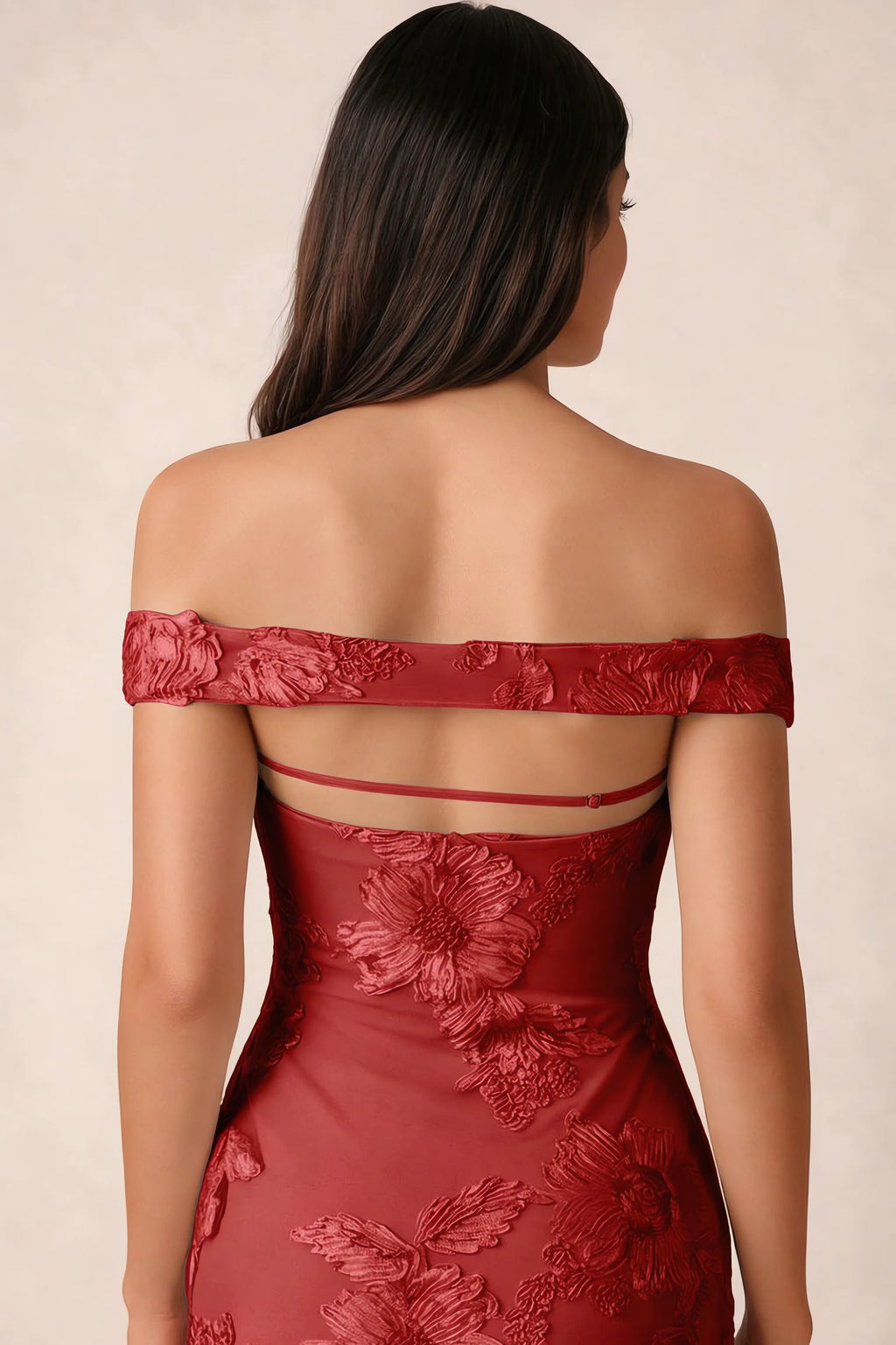 Close-up of Bridgette red open back framed by the shoulder band and slim horizontal strap