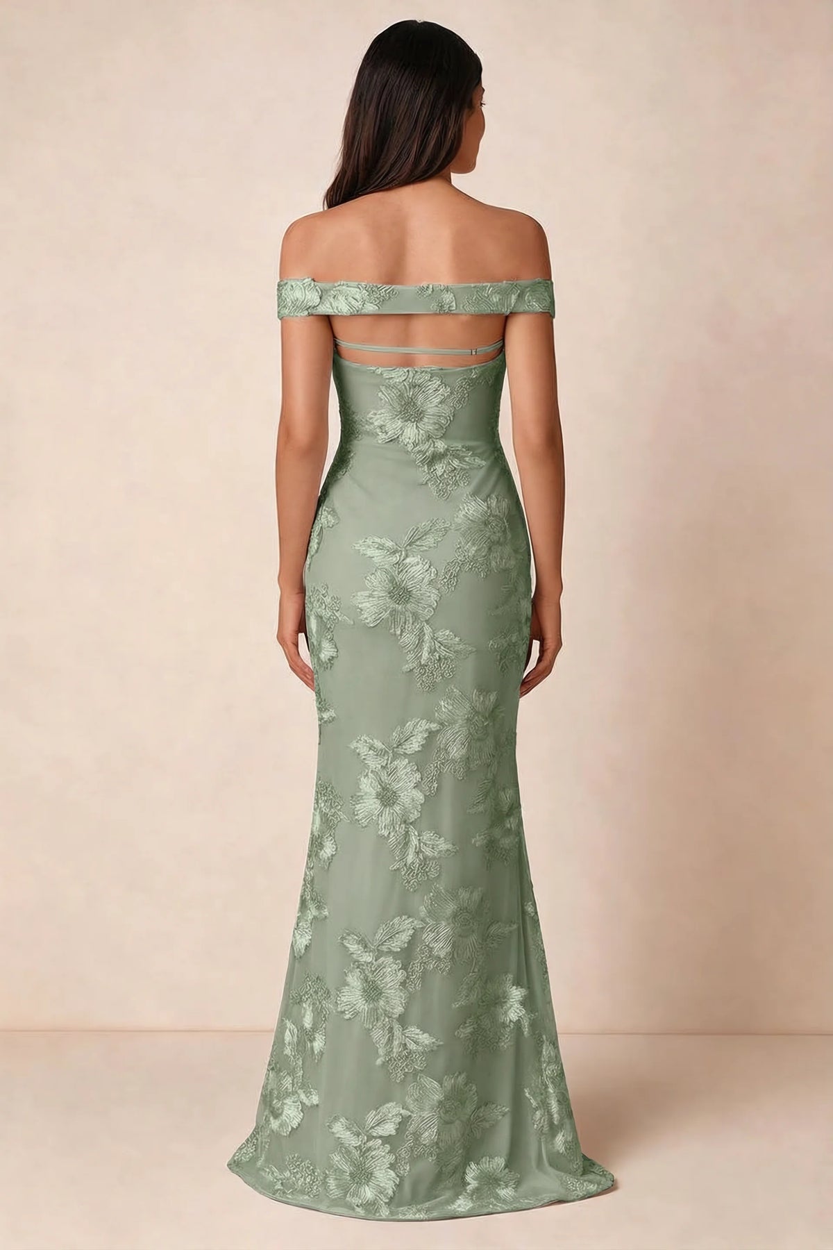 Rear studio view of Bridgette sage green dress showing the horizontal straps across the open upper back