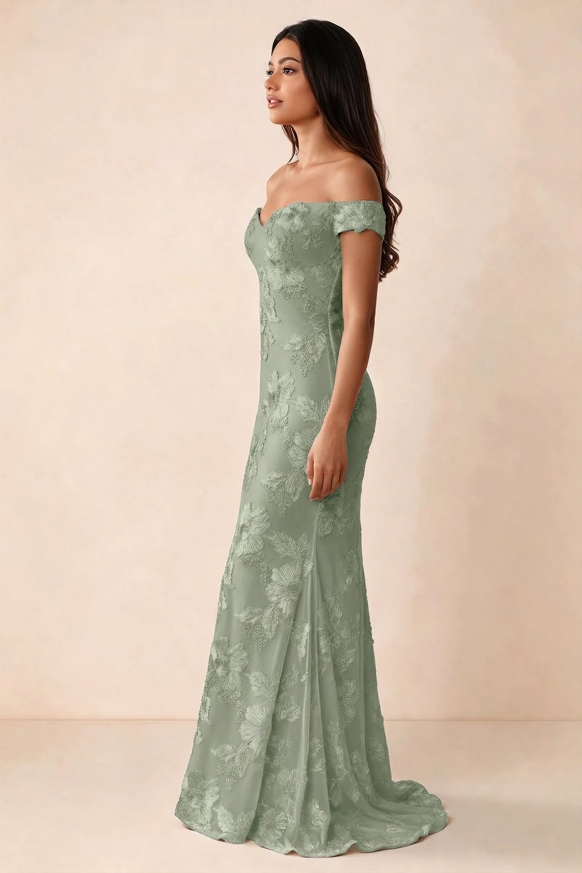 Side studio view of Bridgette sage green dress showing the fitted hips and trailing back hem