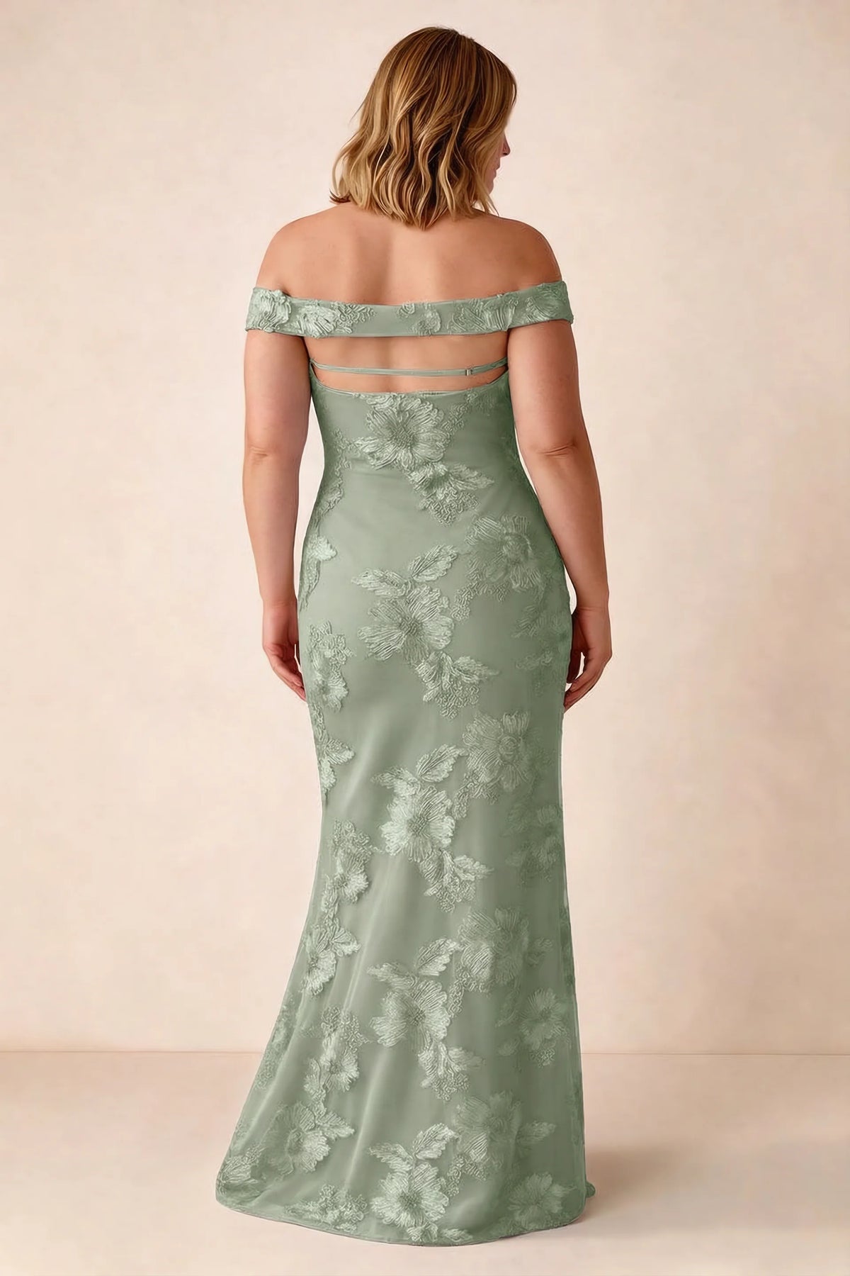 Rear studio view of Bridgette sage green dress on a second model, showing the flared skirt