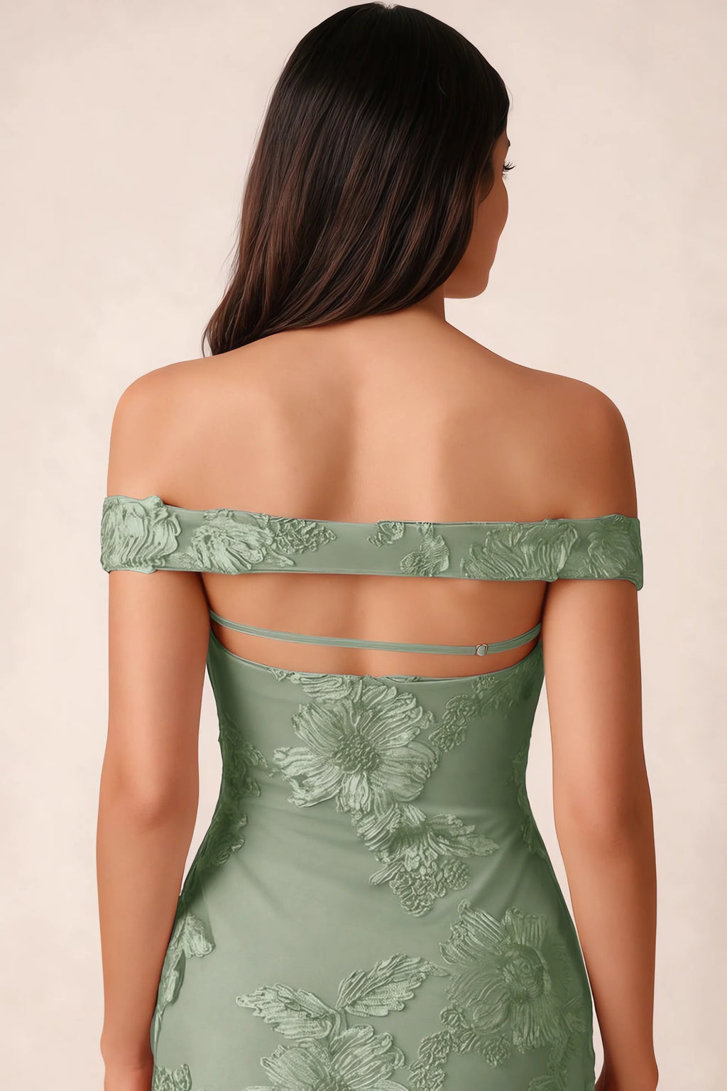 Close-up of Bridgette sage green open back framed by the shoulder band and slim horizontal strap
