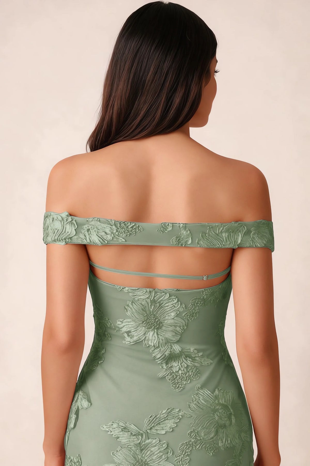 Close-up of Bridgette sage green open back framed by the shoulder band and slim horizontal strap