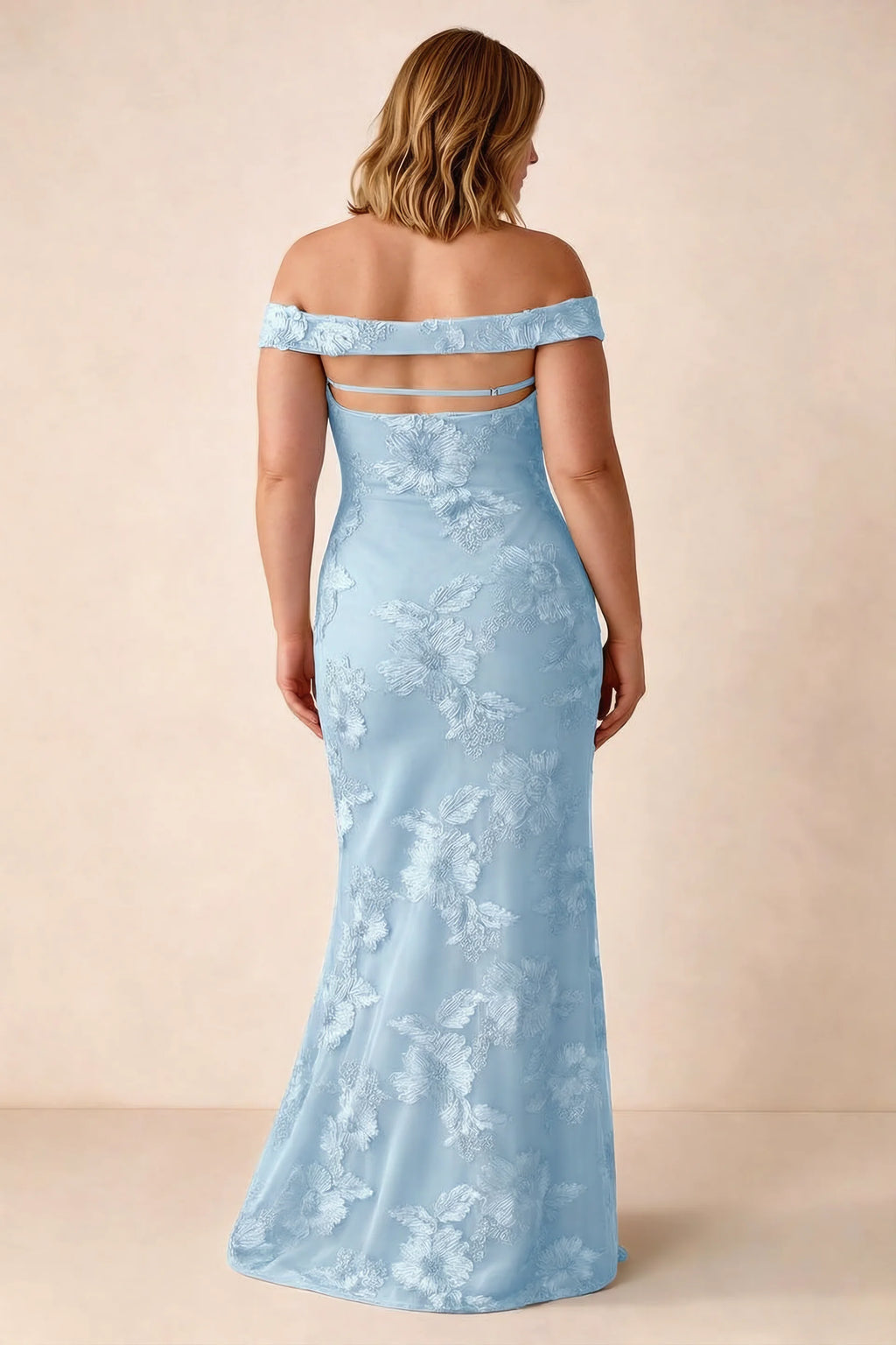 Rear studio view of Bridgette sky blue dress on a second model, showing the flared skirt