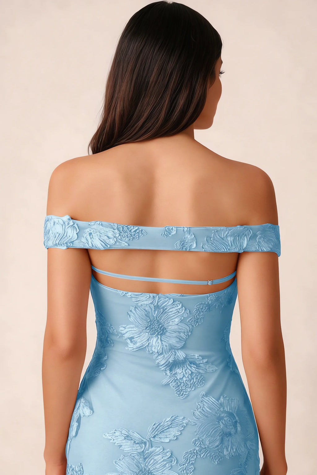 Close-up of Bridgette sky blue open back framed by the shoulder band and slim horizontal strap