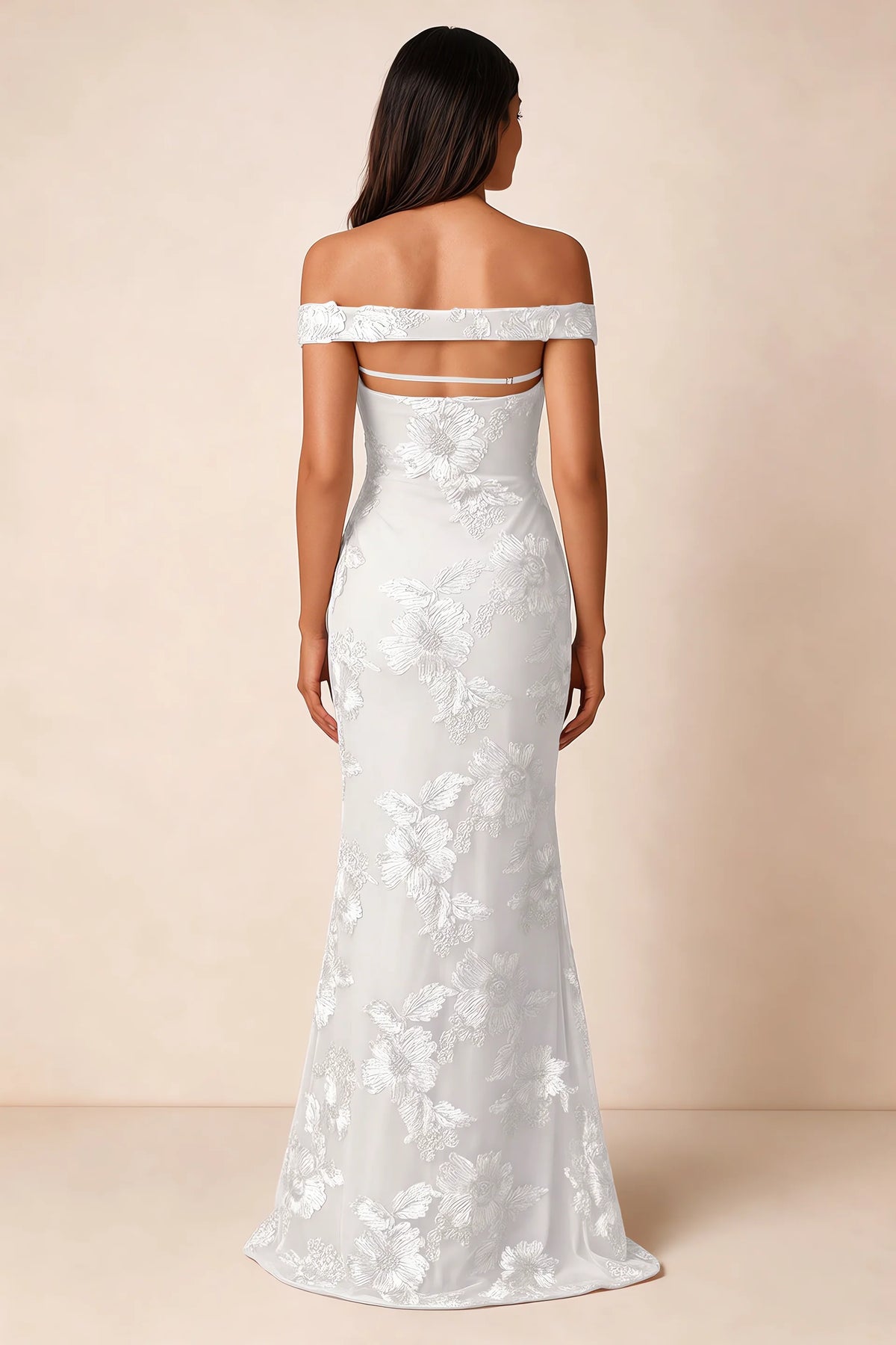 Rear studio view of Bridgette white dress showing the horizontal straps across the open upper back