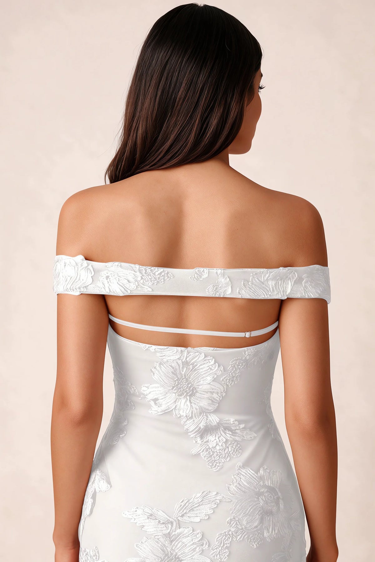 Close-up of Bridgette white open back framed by the shoulder band and slim horizontal strap