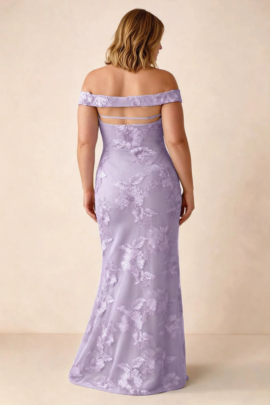 Rear studio view of Bridgette wisteria dress on a second model, showing the flared skirt
